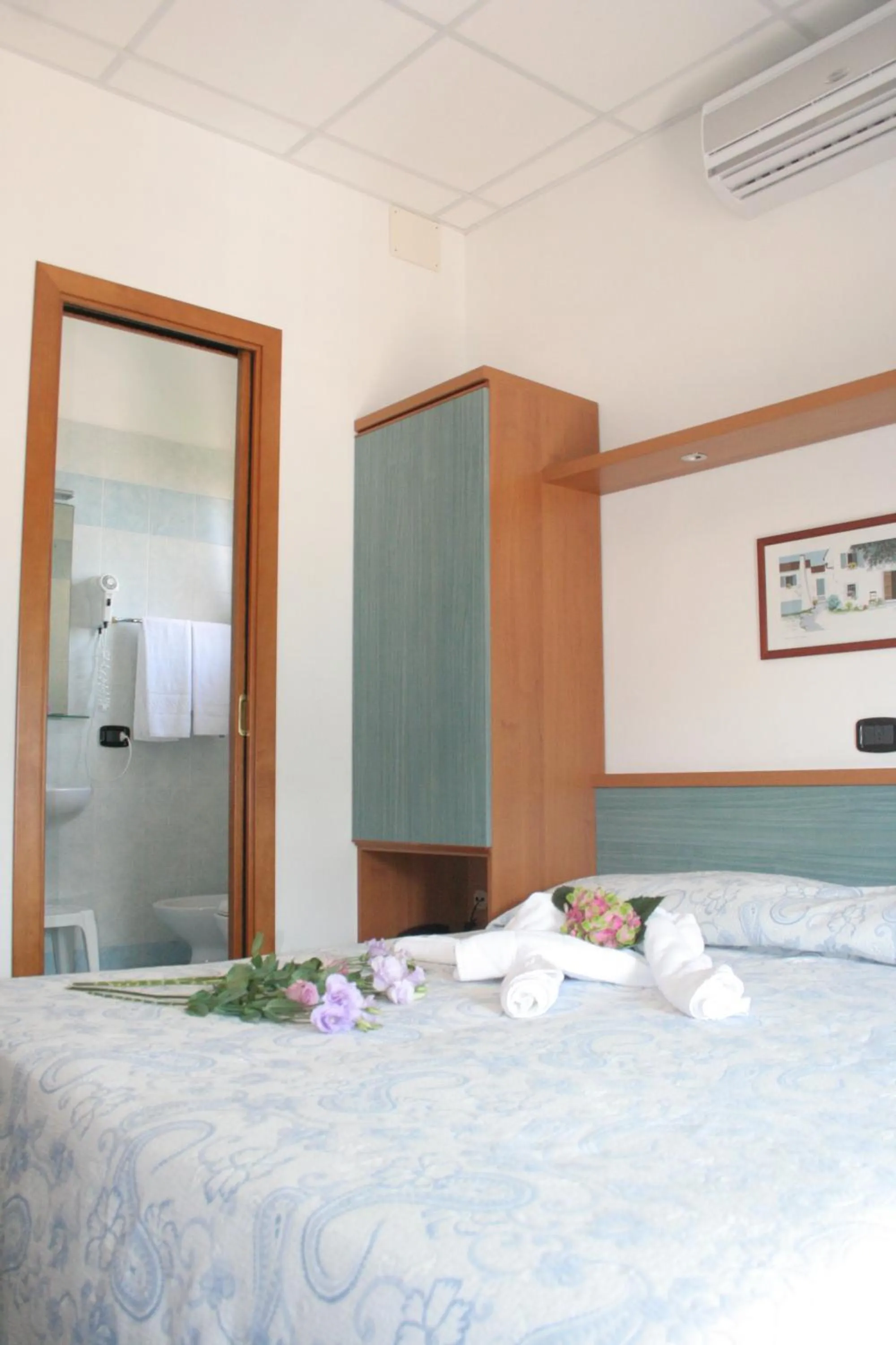 Bed in Hotel Trifoglio