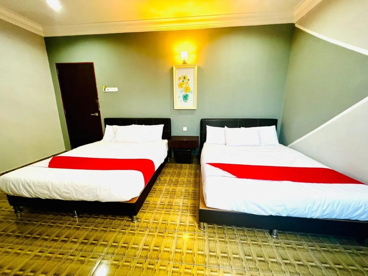 Bed in DAILY INN HOTEL