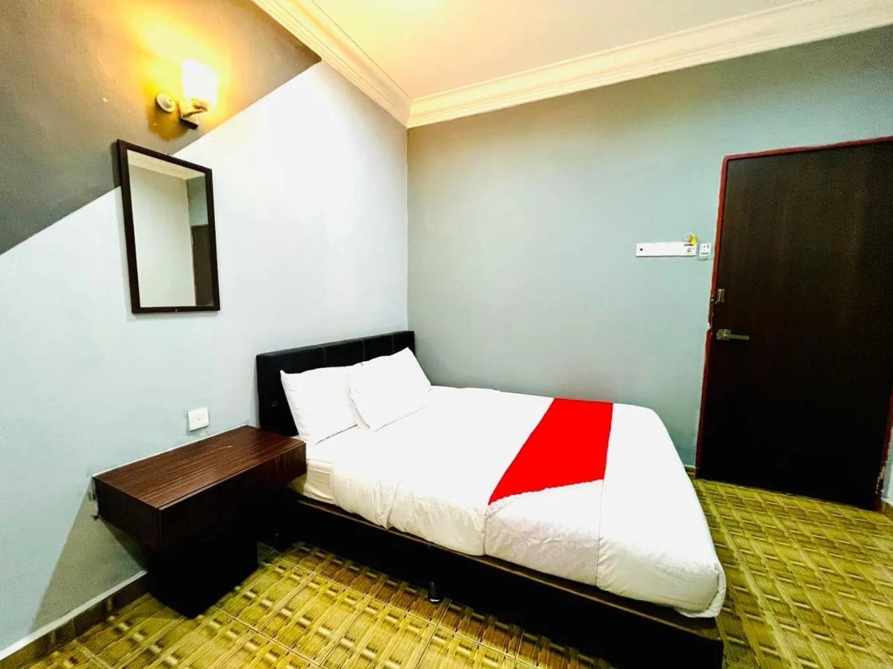 Bed in DAILY INN HOTEL