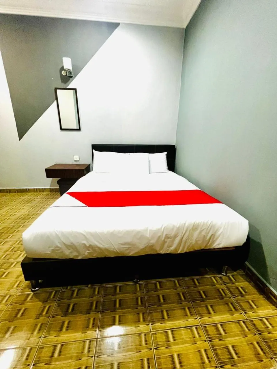 Bed in DAILY INN HOTEL