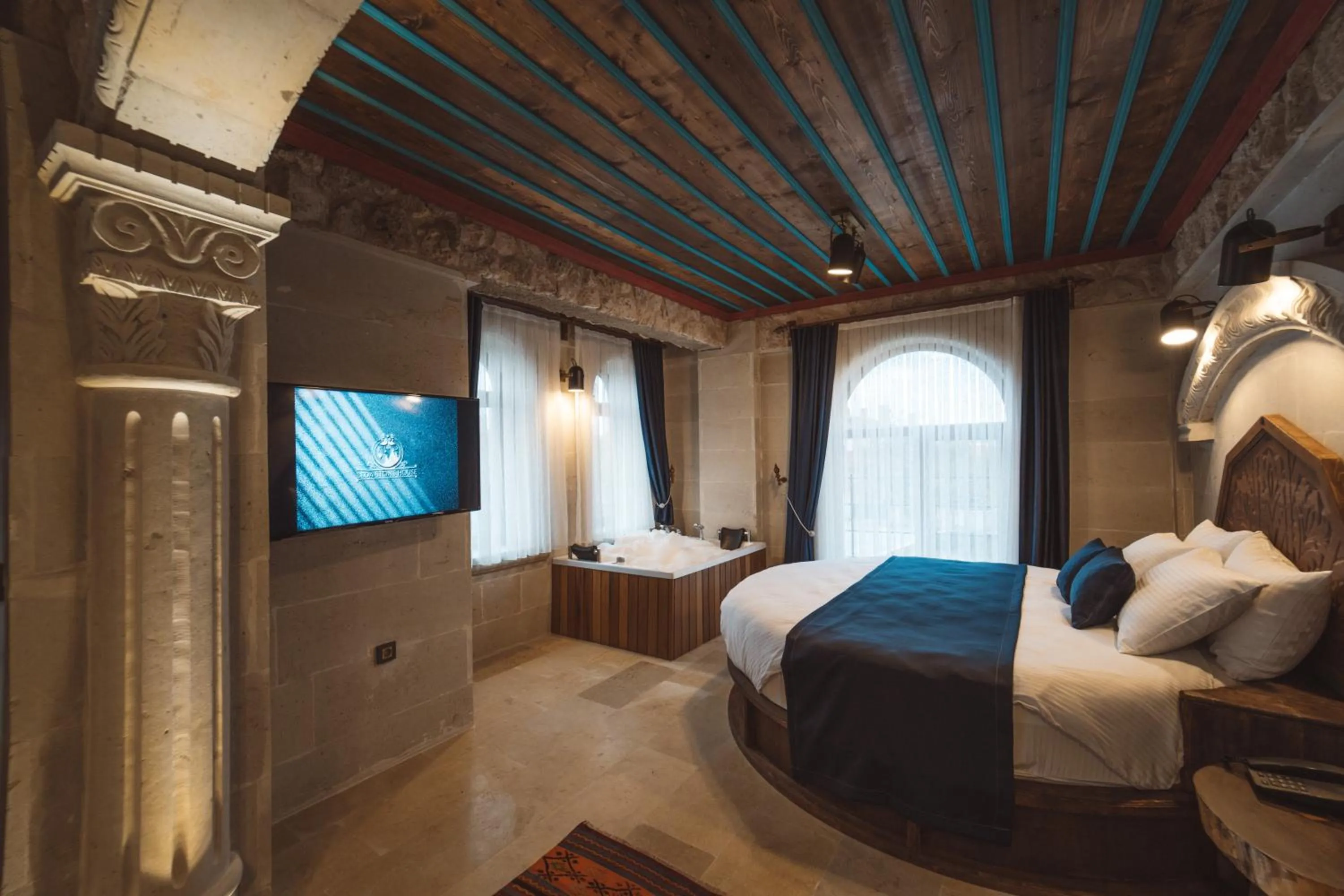 Bed in Leda Stone House