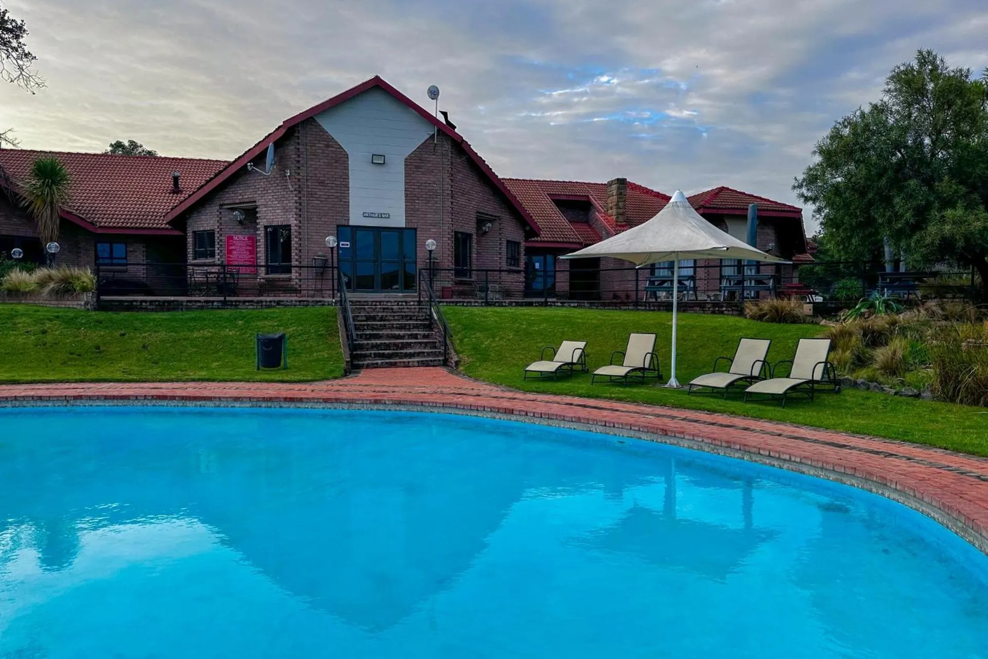 Property building in First Group Qwantani