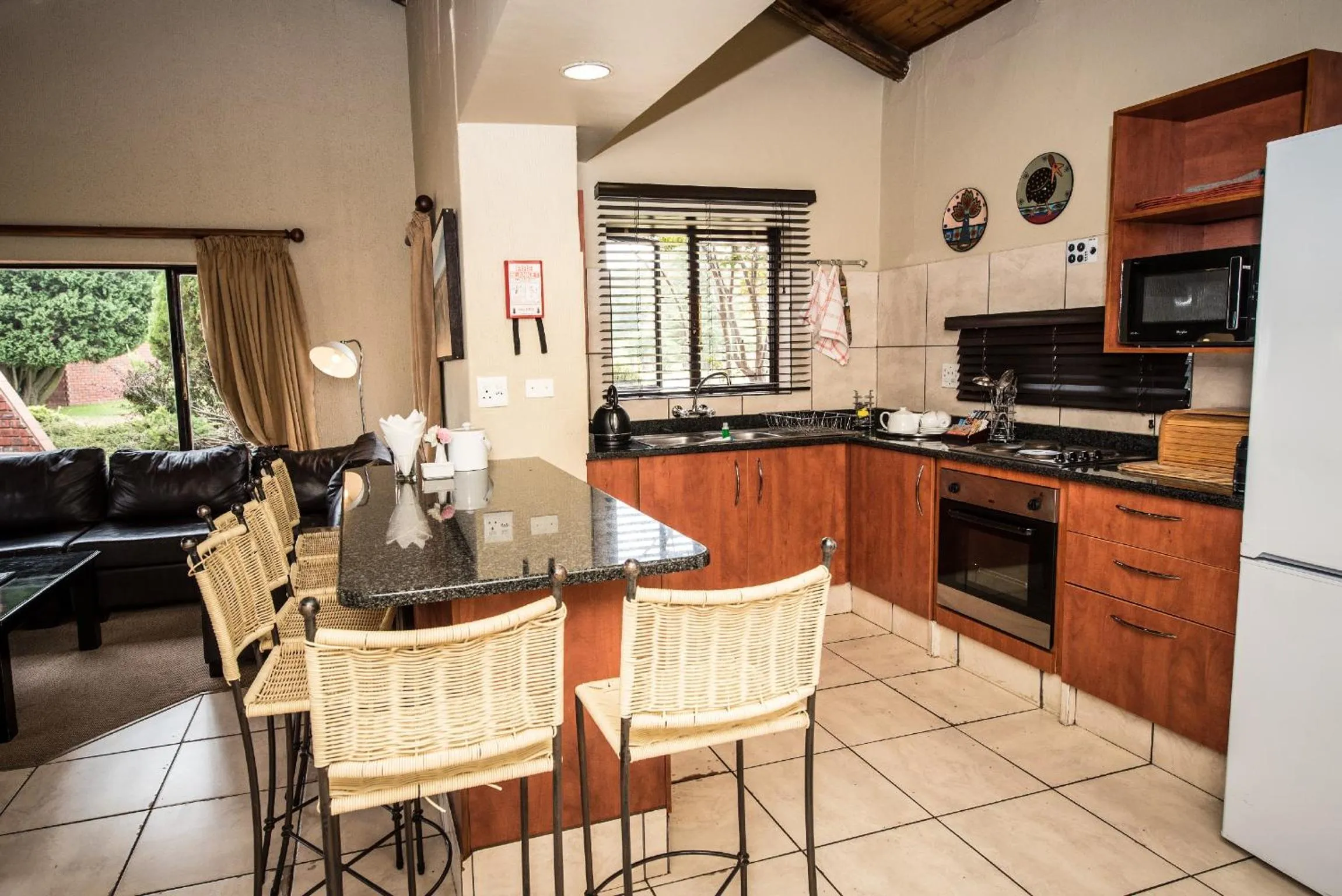 Kitchen or kitchenette in First Group Qwantani