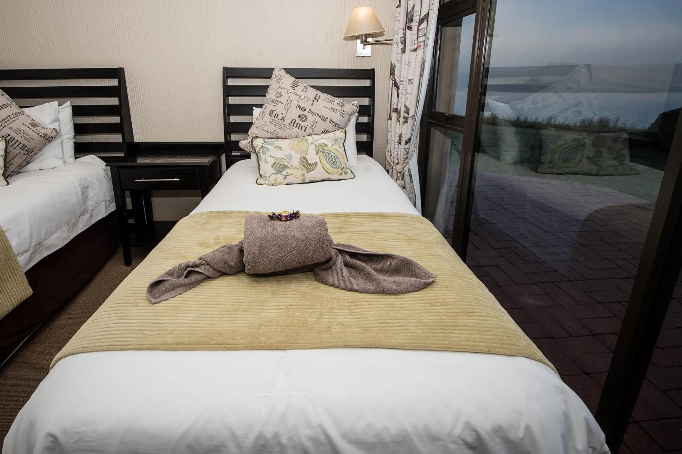 Bed in First Group Qwantani