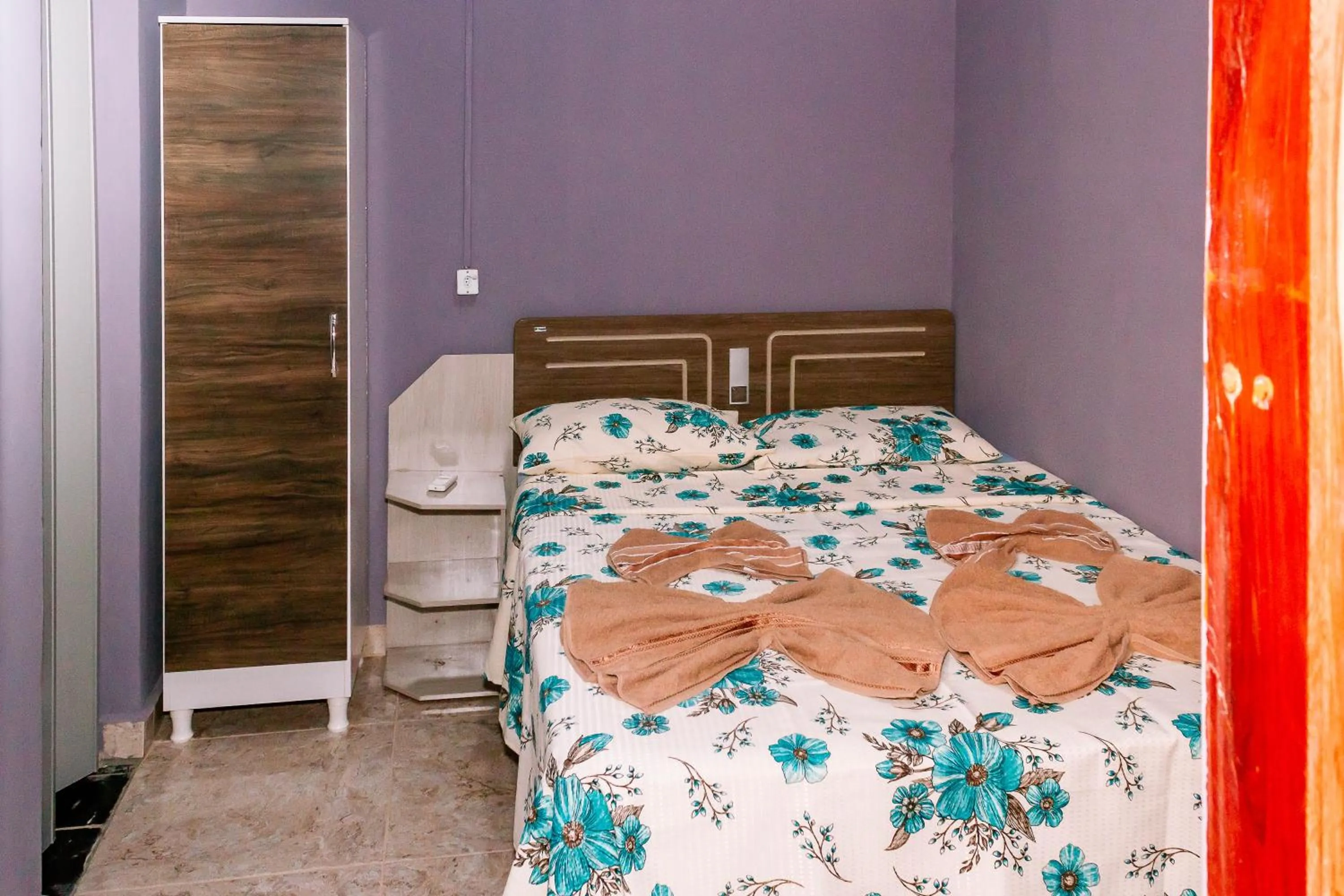 Bed in Pousada Cachoeira da Fumaça