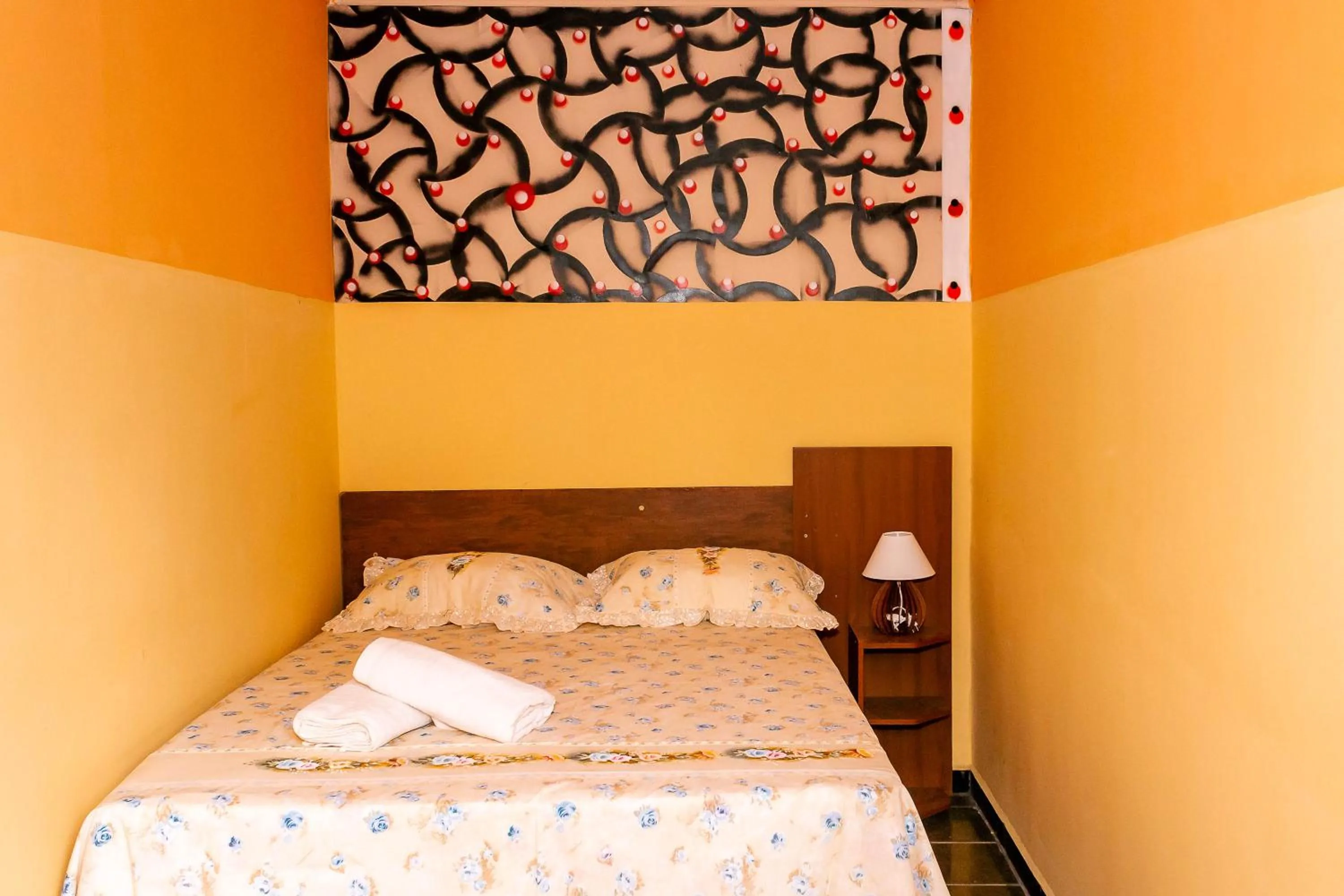 Bed in Pousada Cachoeira da Fumaça