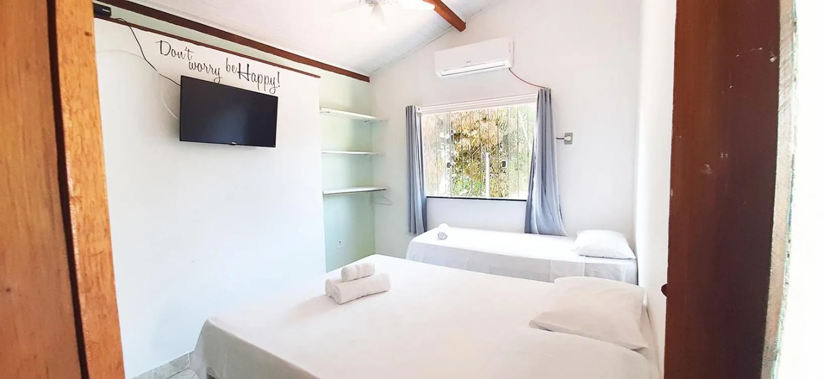 Bed in Pousada Semente