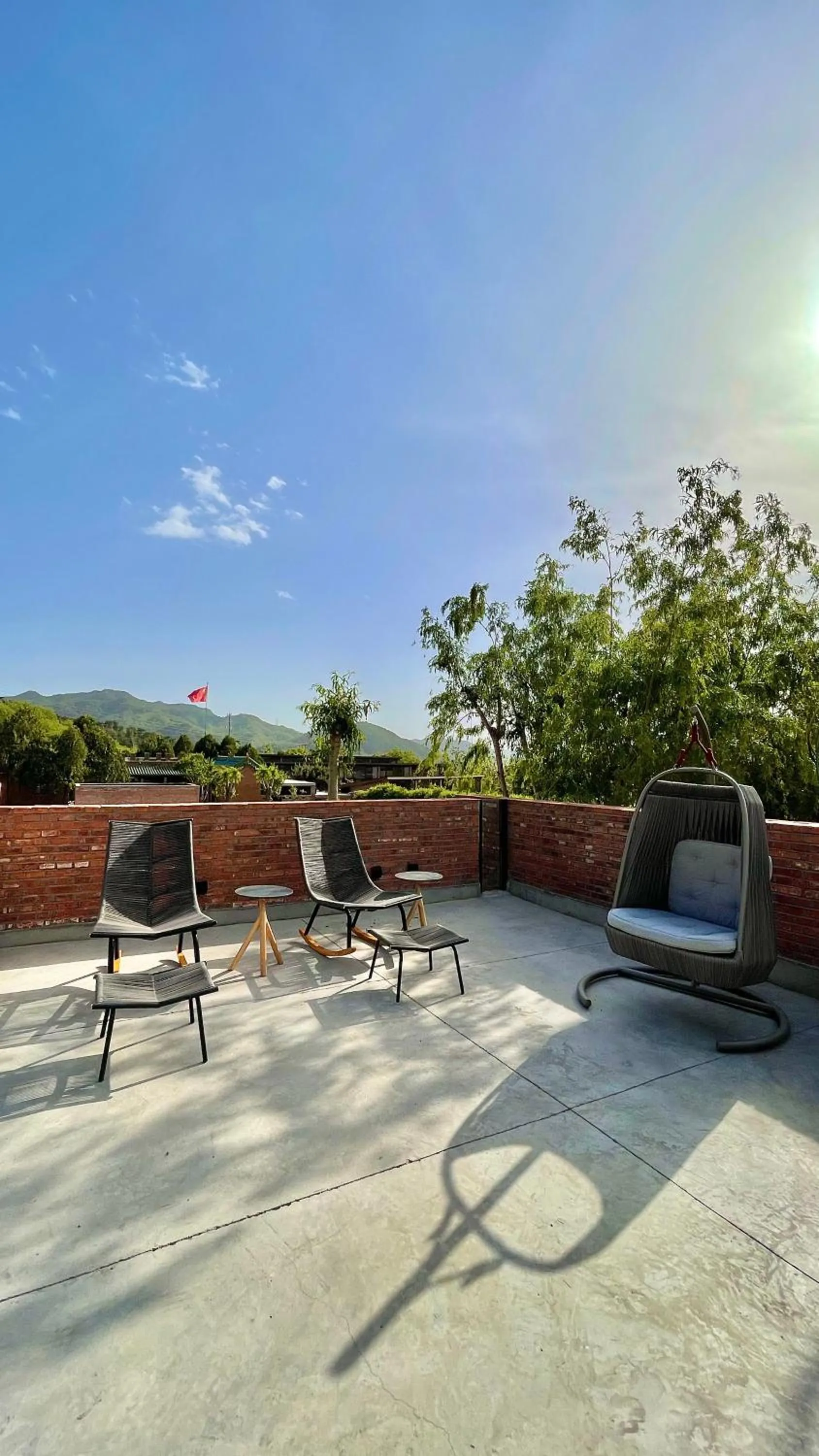 Balcony/Terrace in Brickyard Retreat at Mutianyu Great Wall Adjoin to Mutianyu Great Wall - Room with the View of Great Wall - Jacuzzi with the View of Great Wall - Vehicle Shuttle Service - International Catering - SPA& Nail Beauty Facilities