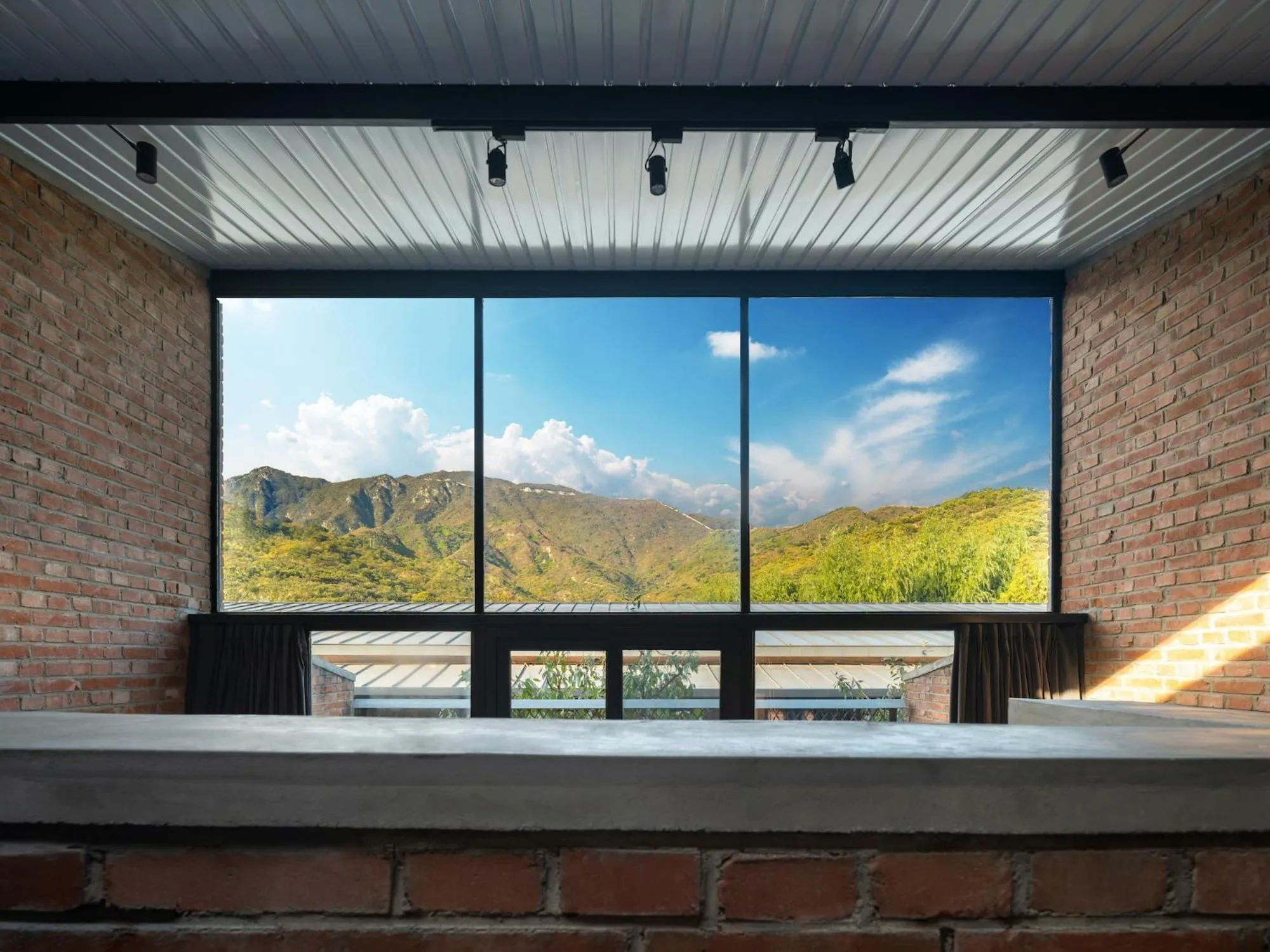 Mountain view in Brickyard Retreat at Mutianyu Great Wall Adjoin to Mutianyu Great Wall - Room with the View of Great Wall - Jacuzzi with the View of Great Wall - Vehicle Shuttle Service - International Catering - SPA& Nail Beauty Facilities