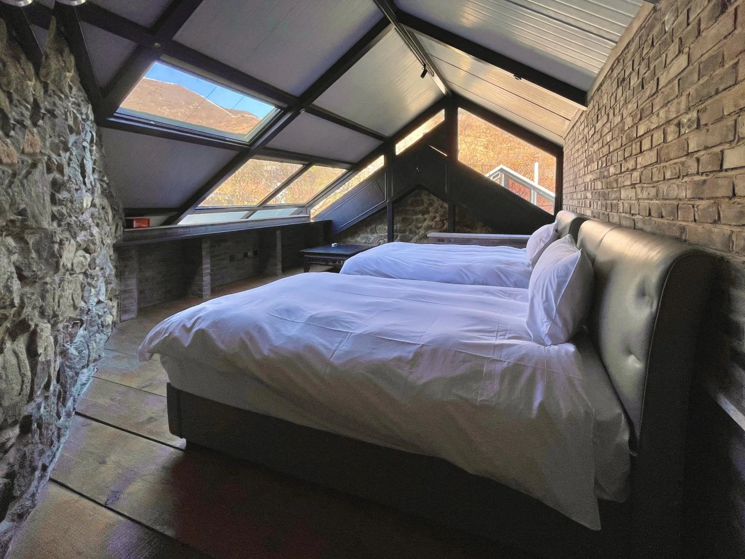 Bedroom, Bed in Brickyard Retreat at Mutianyu Great Wall Adjoin to Mutianyu Great Wall - Room with the View of Great Wall - Jacuzzi with the View of Great Wall - Vehicle Shuttle Service - International Catering - SPA& Nail Beauty Facilities