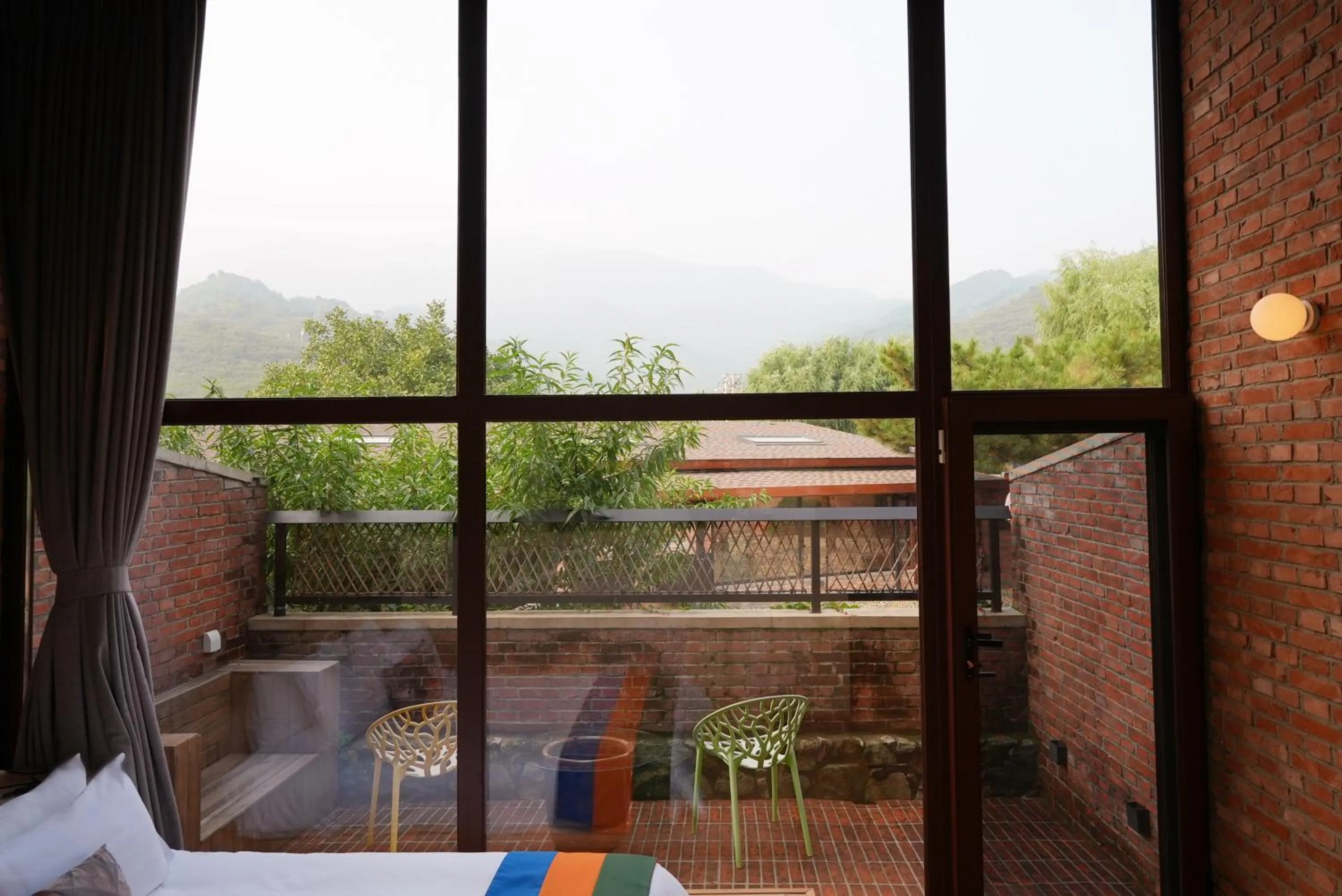 View (from property/room) in Brickyard Retreat at Mutianyu Great Wall Adjoin to Mutianyu Great Wall - Room with the View of Great Wall - Jacuzzi with the View of Great Wall - Vehicle Shuttle Service - International Catering - SPA& Nail Beauty Facilities