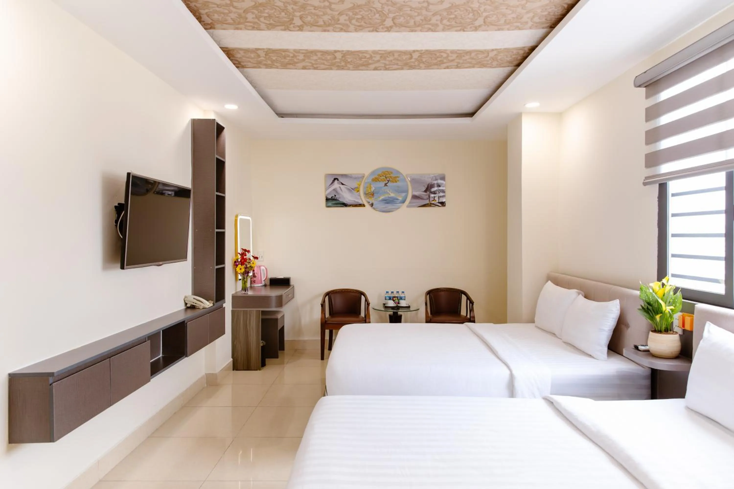 Bed in Boss Palace Hotel