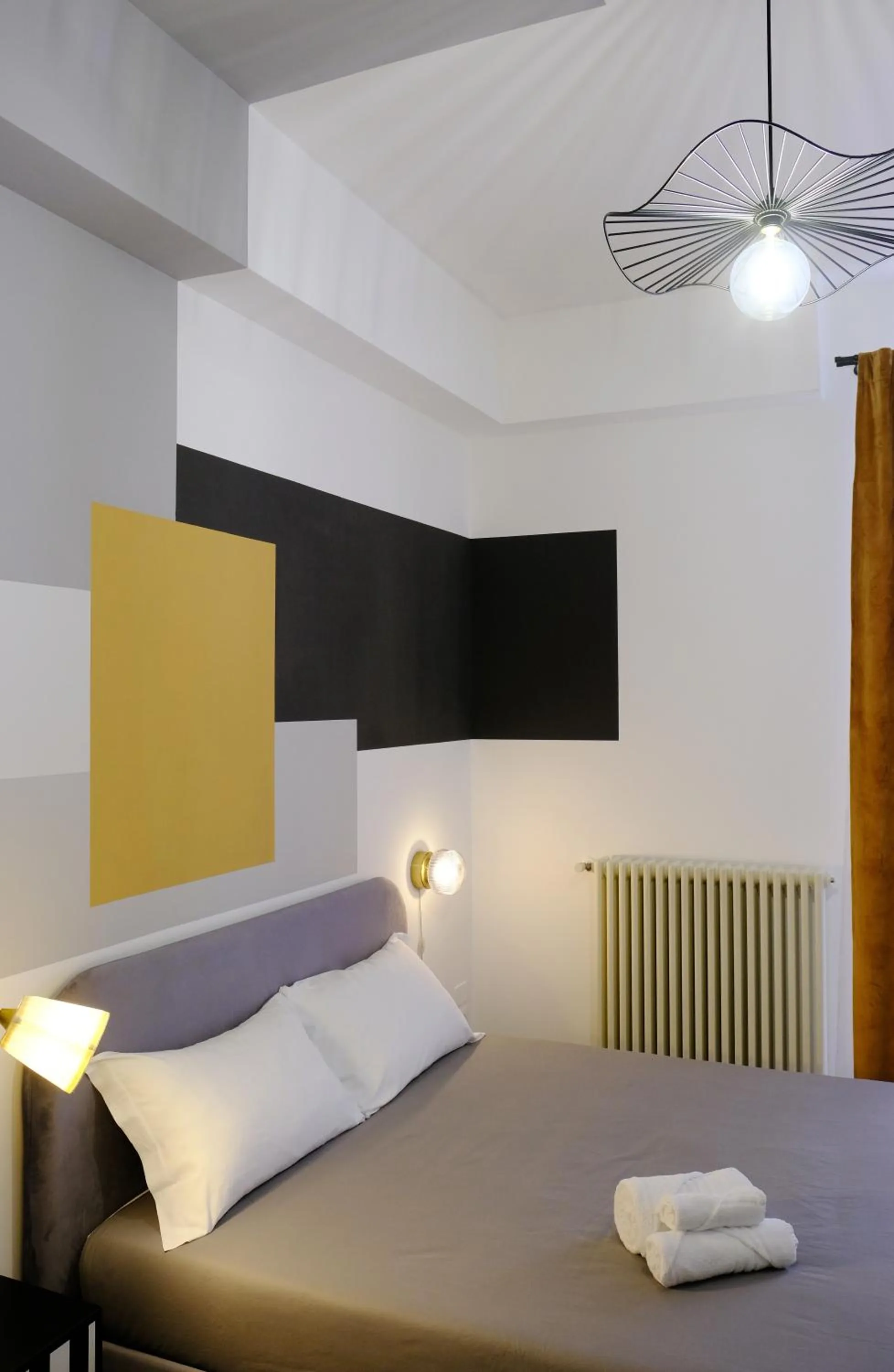 Bed in MATTEOTTI ROOMS