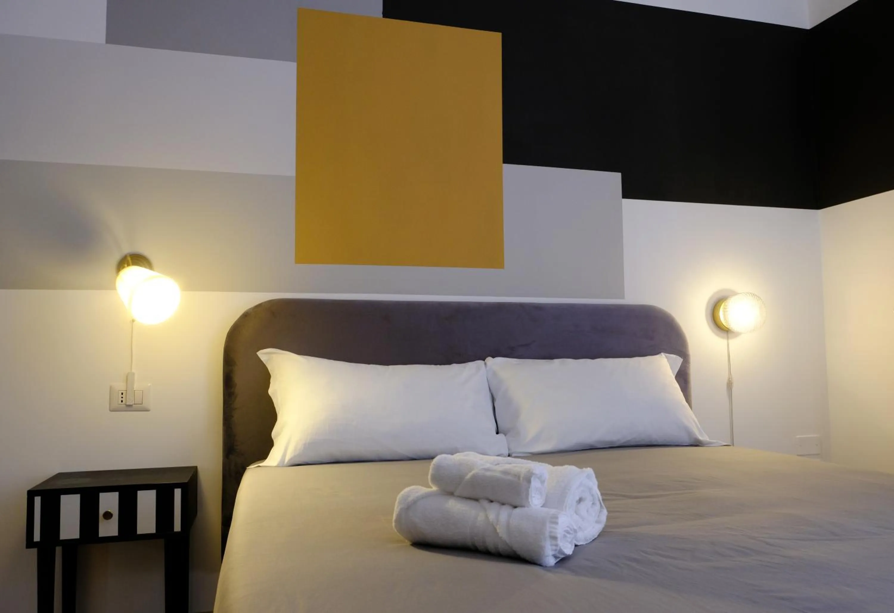 Bed in MATTEOTTI ROOMS
