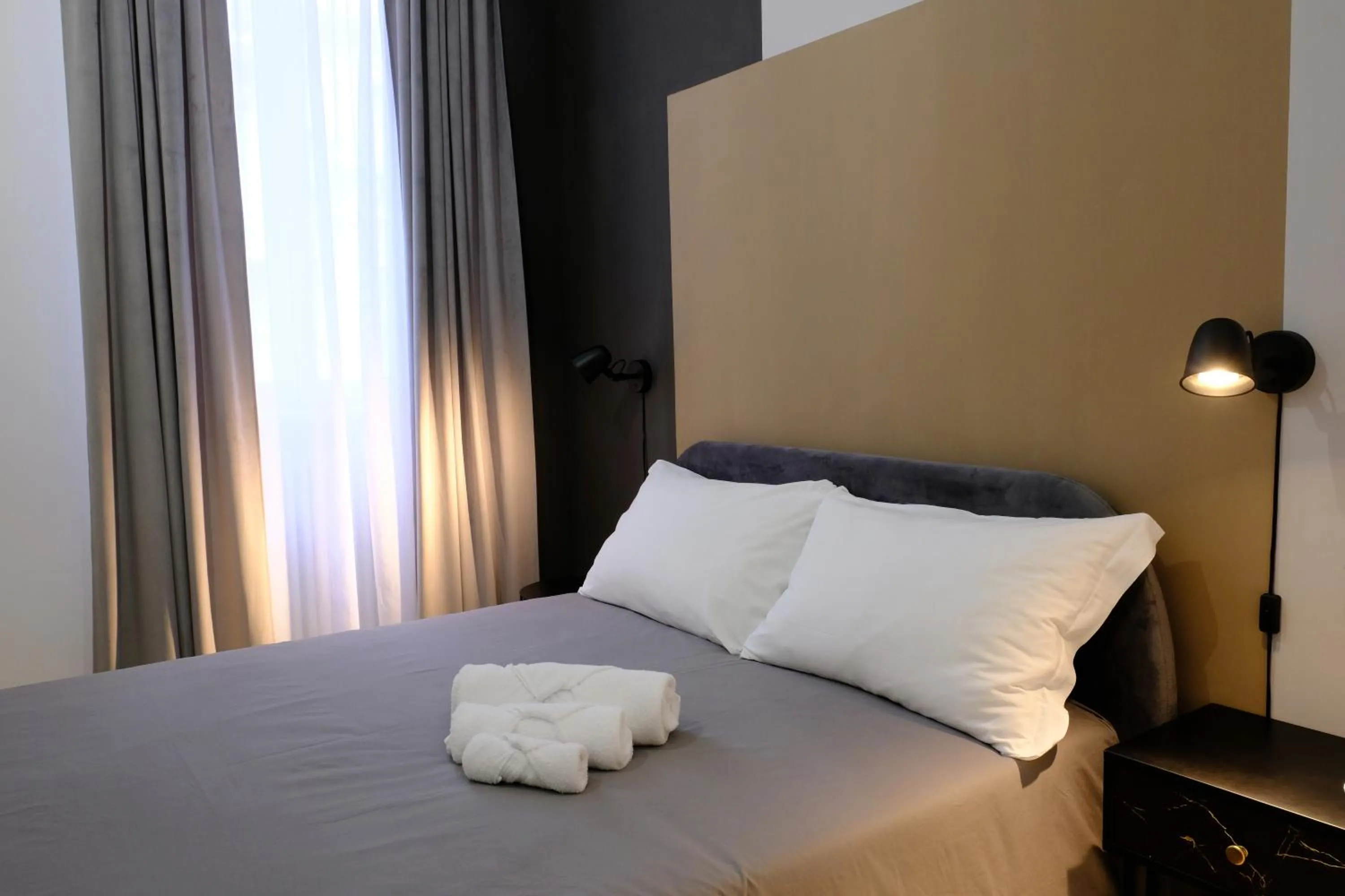 Bed in MATTEOTTI ROOMS