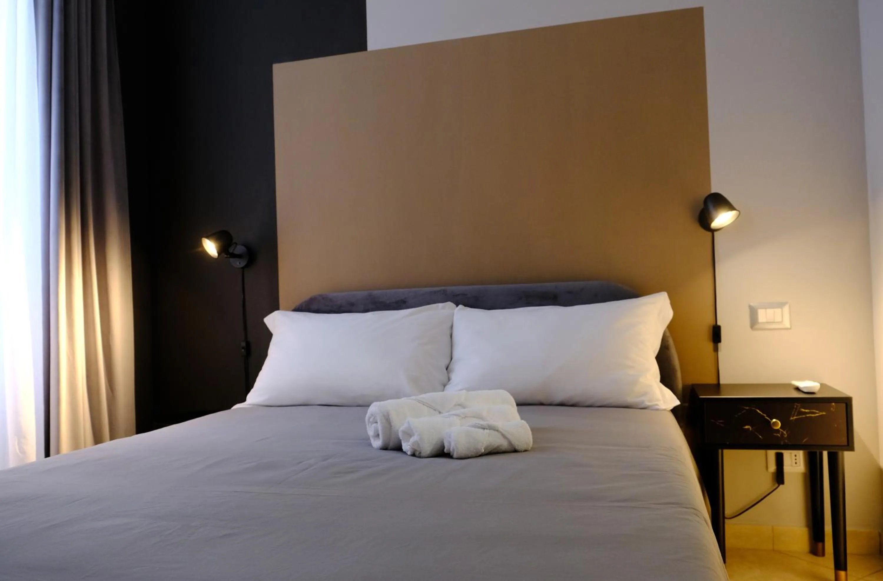 Bed in MATTEOTTI ROOMS