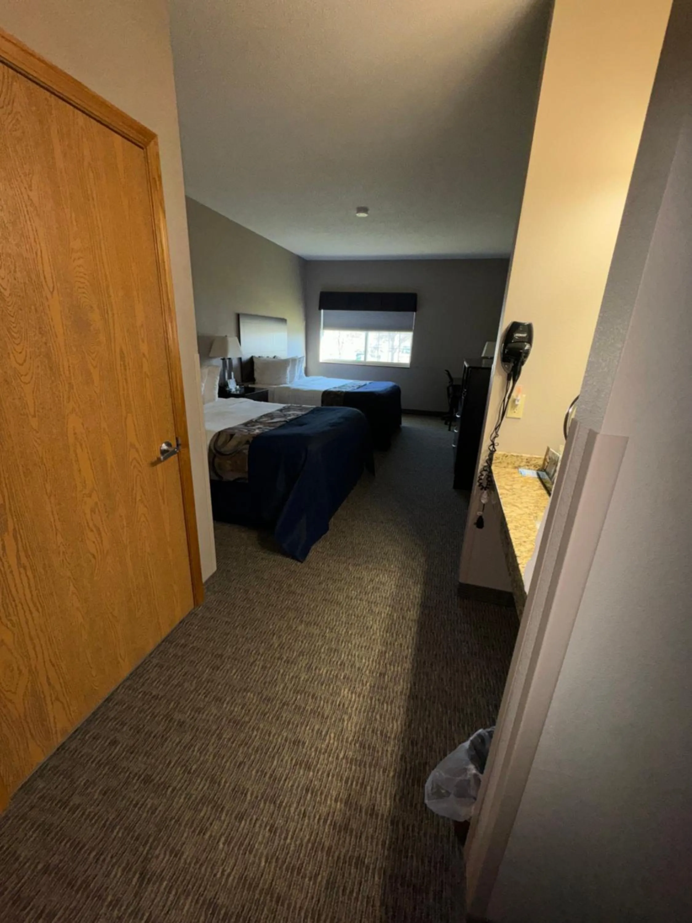 Bed in Garner INN & Suites