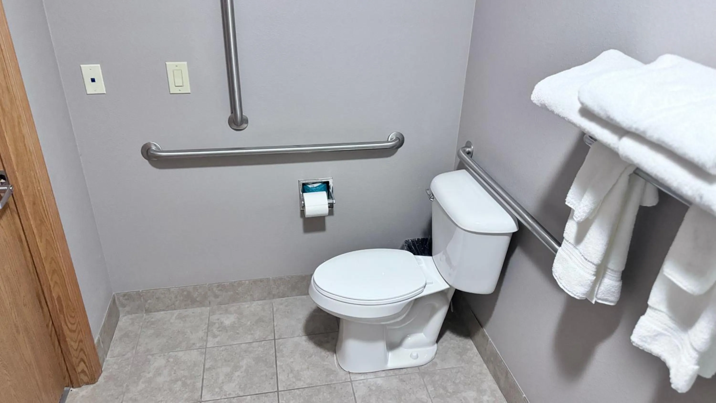 Toilet in Garner INN & Suites