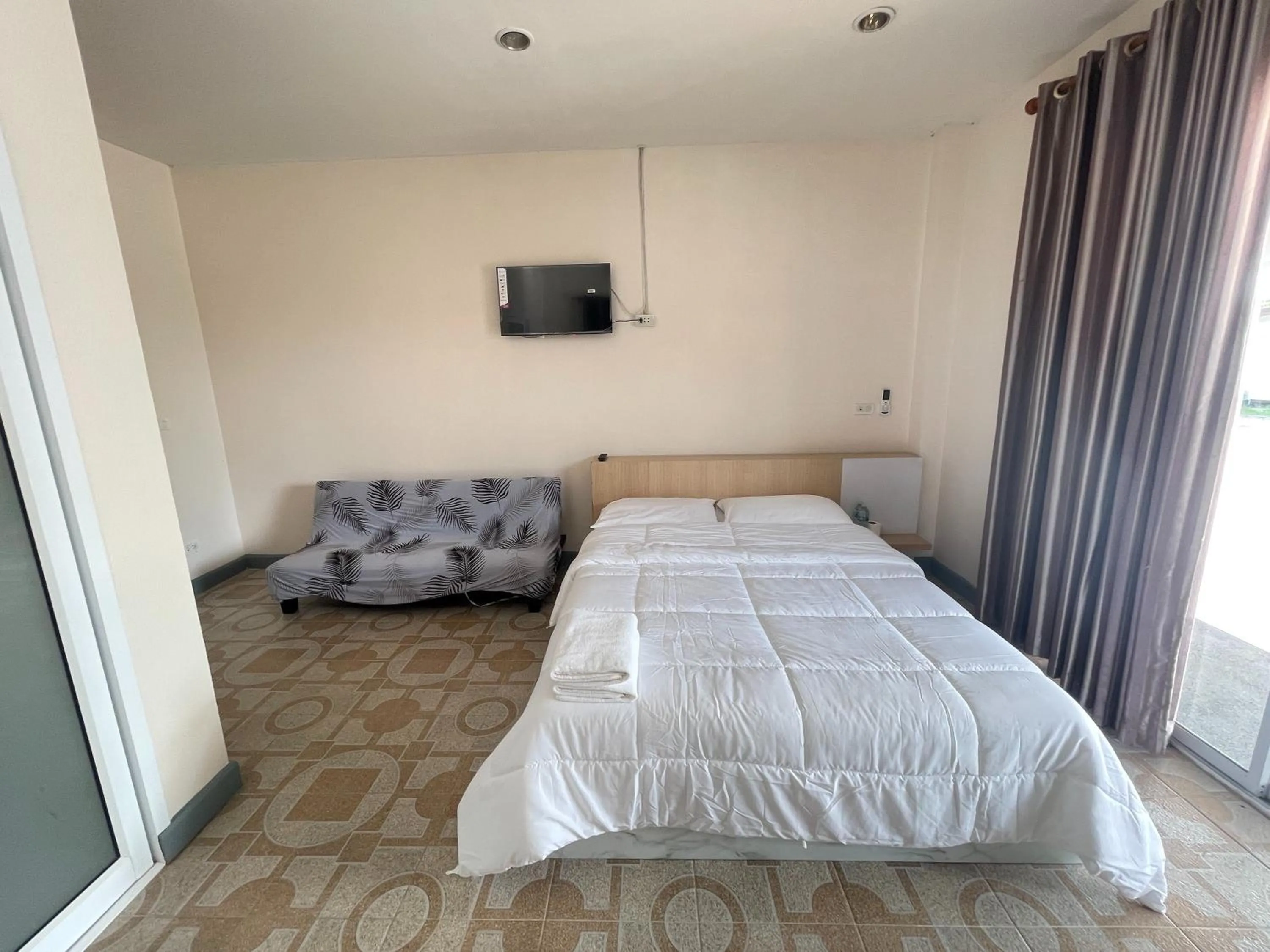 Seating area, Bed in Oh Taley Resort