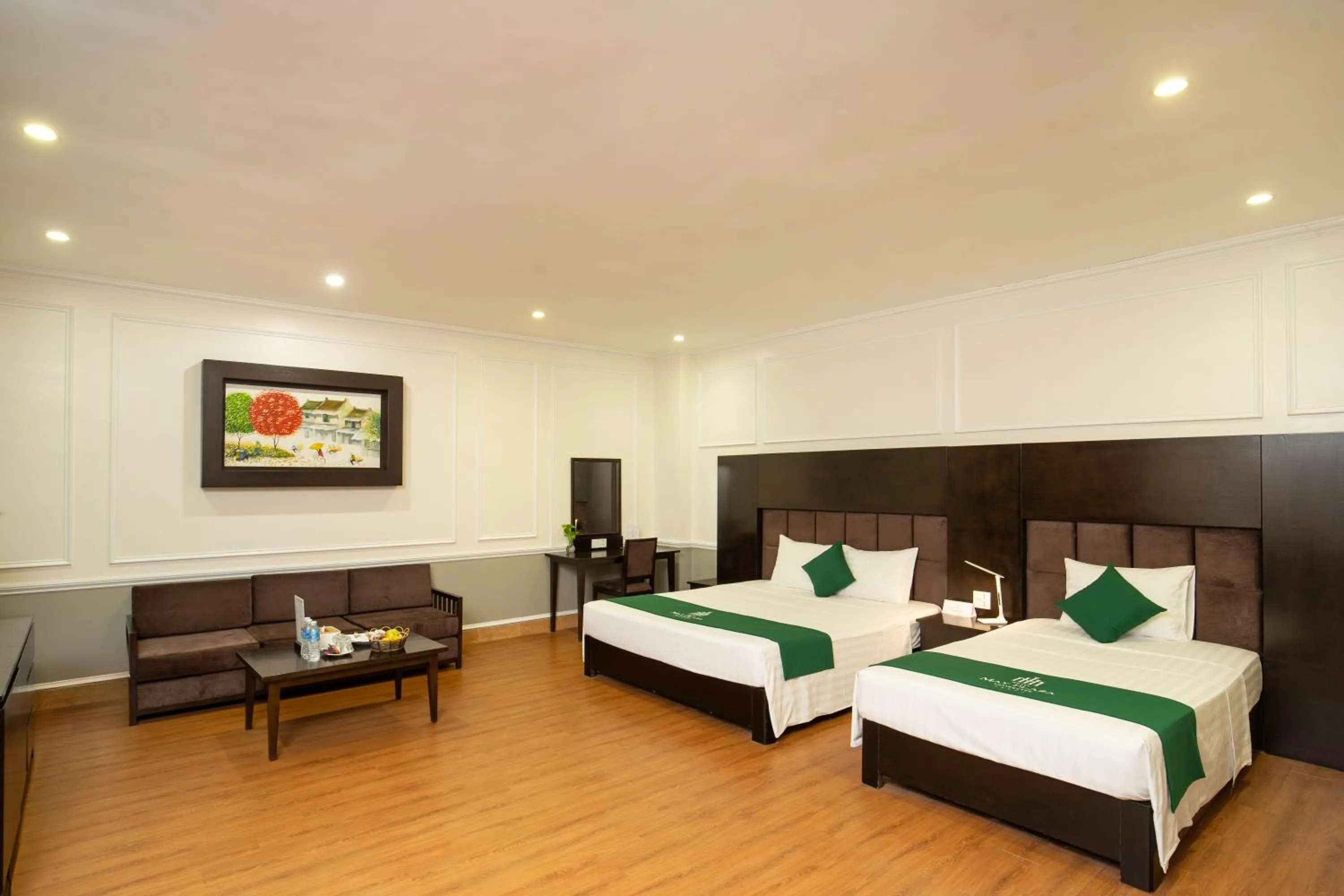 Bed in MAY PLAZA HOTEL