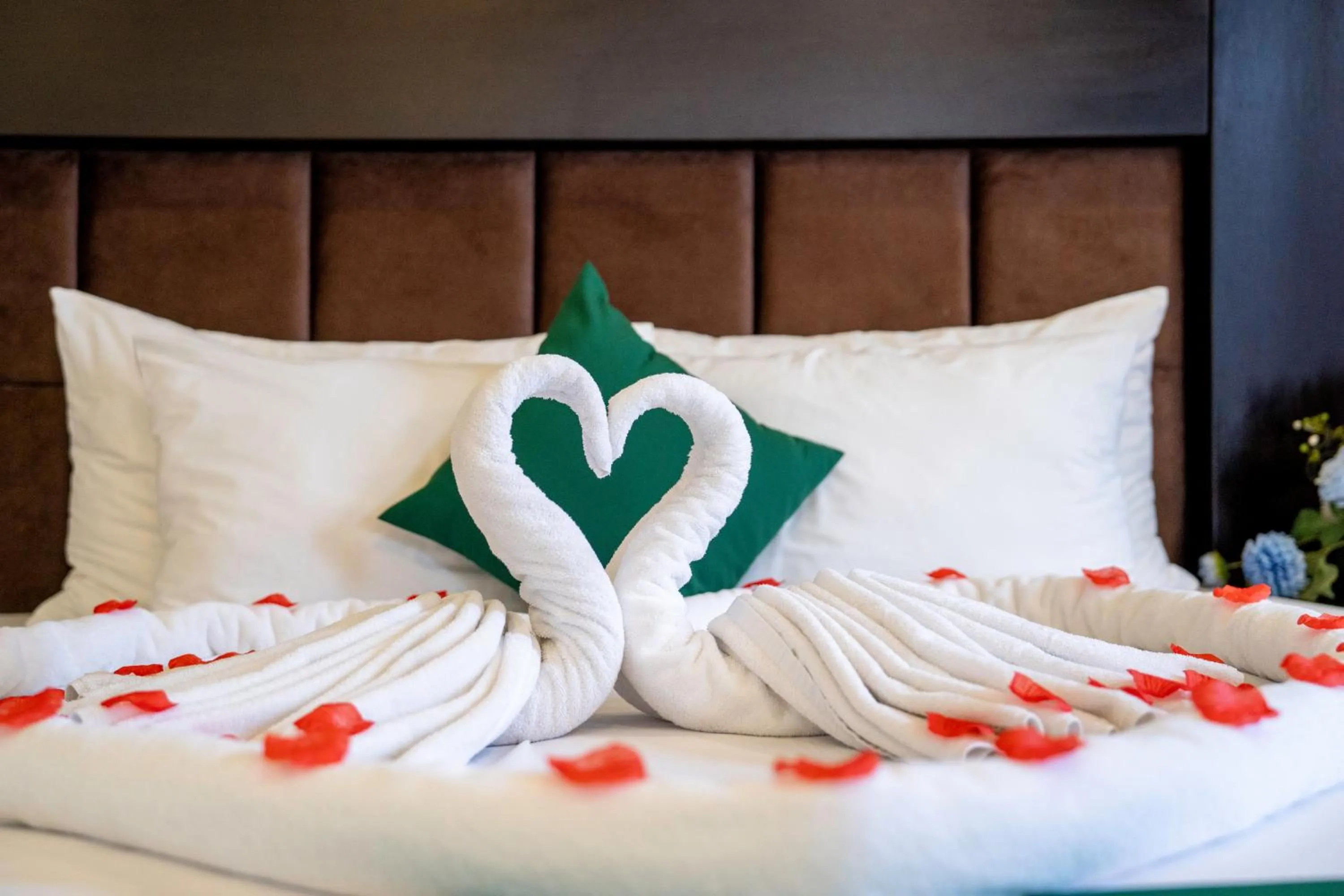 Bed in MAY PLAZA HOTEL