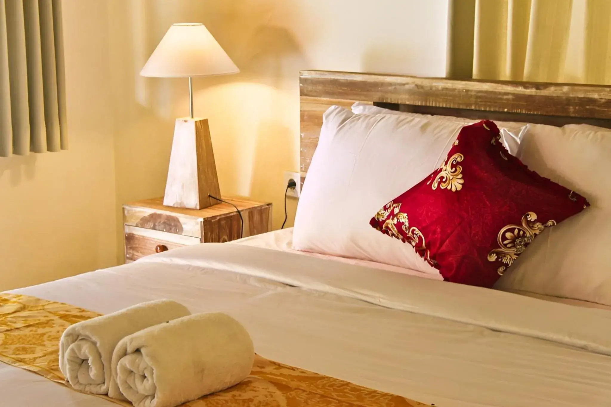 Bed in Buruan Sari Villas by AGATA Bed in Buruan Sari Villas by AGATA