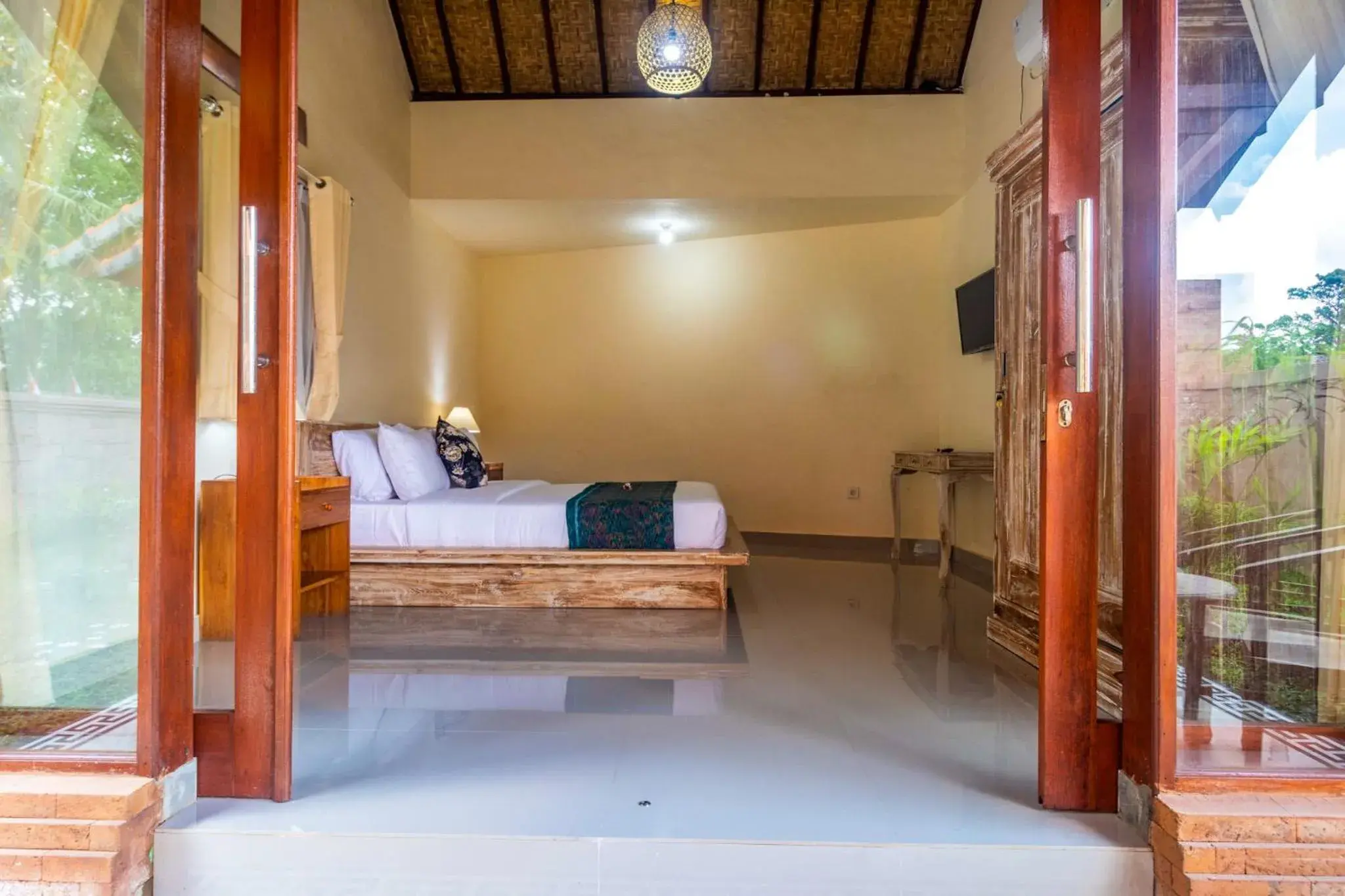 Bed in Buruan Sari Villas by AGATA Bed in Buruan Sari Villas by AGATA