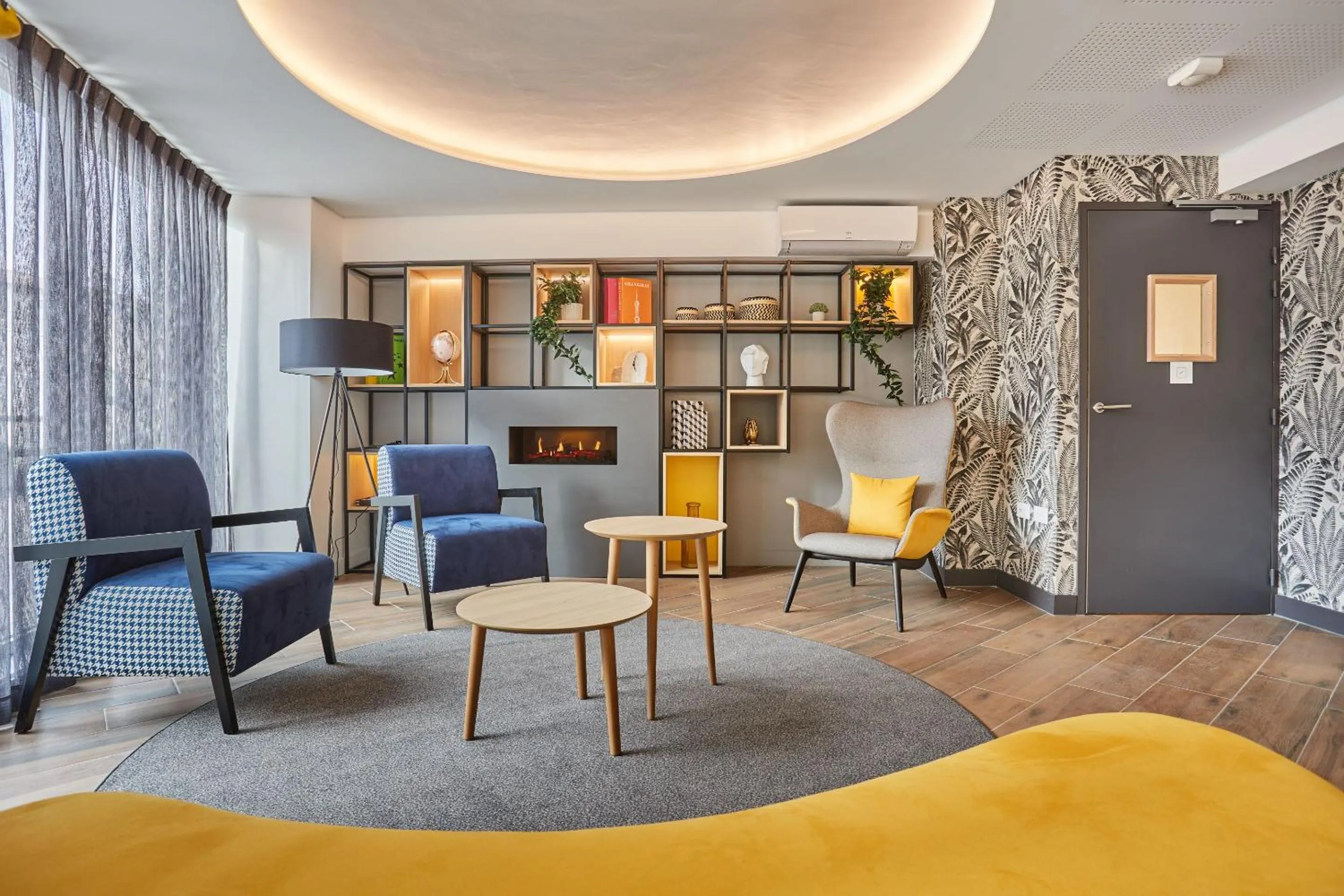 Lobby or reception in Appart'hôtel Odalys City - Nîmes Arènes - Palais des Congrès