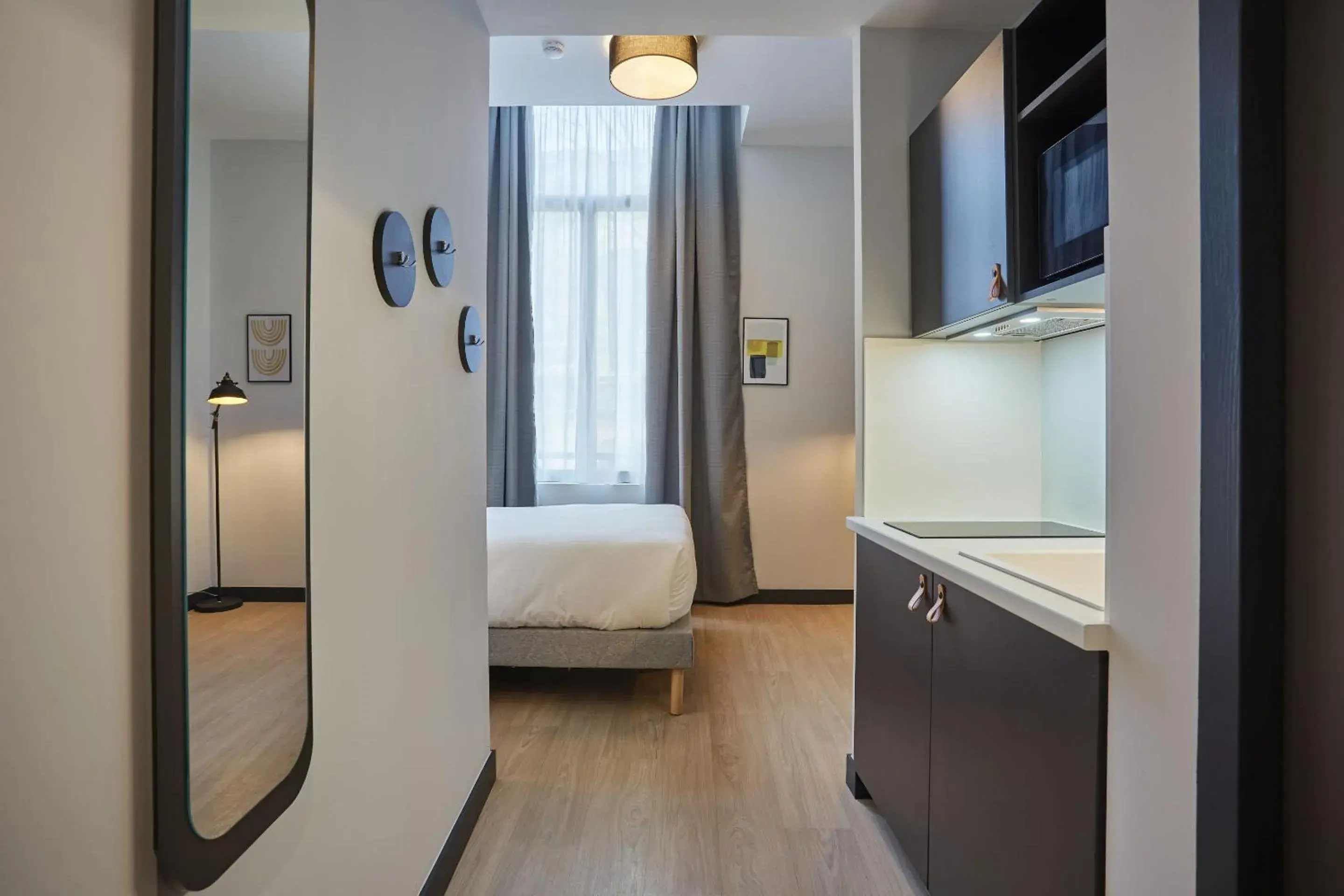 Bedroom, Bed in Appart'hôtel Odalys City - Nîmes Arènes - Palais des Congrès Bedroom, Bed in Appart'hôtel Odalys City - Nîmes Arènes - Palais des Congrès