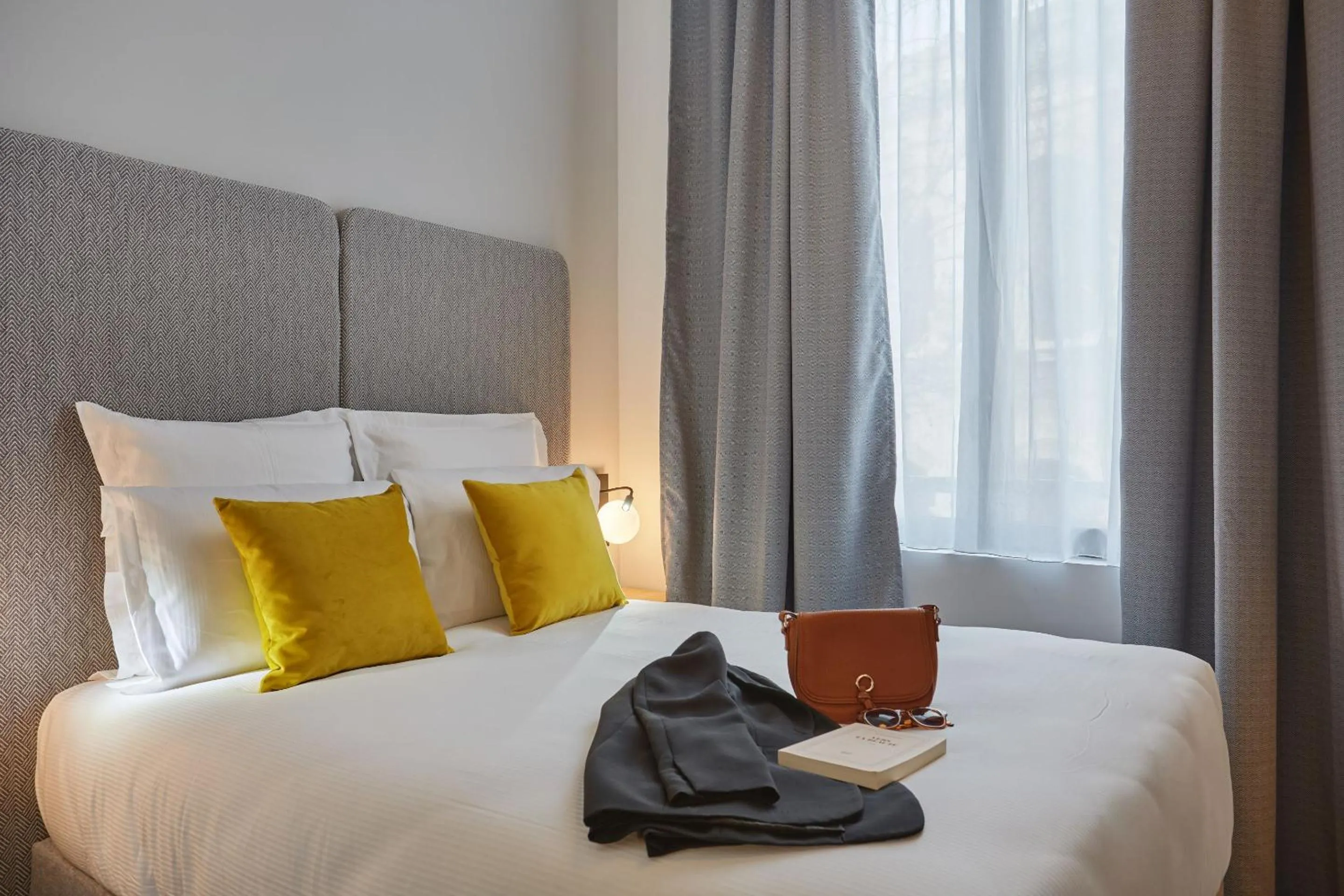 Bedroom, Bed in Appart'hôtel Odalys City - Nîmes Arènes - Palais des Congrès