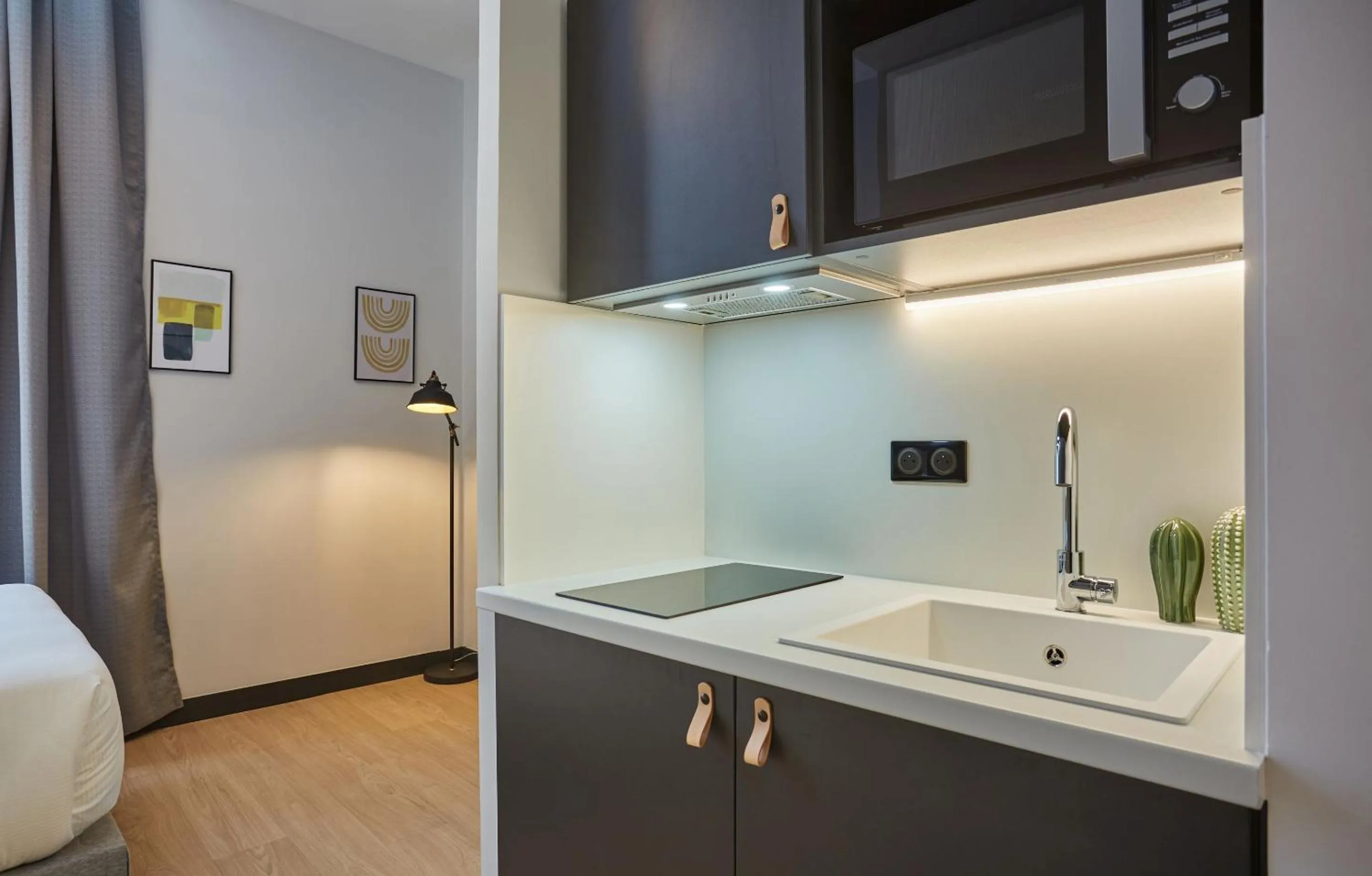 Kitchen or kitchenette in Appart'hôtel Odalys City - Nîmes Arènes - Palais des Congrès