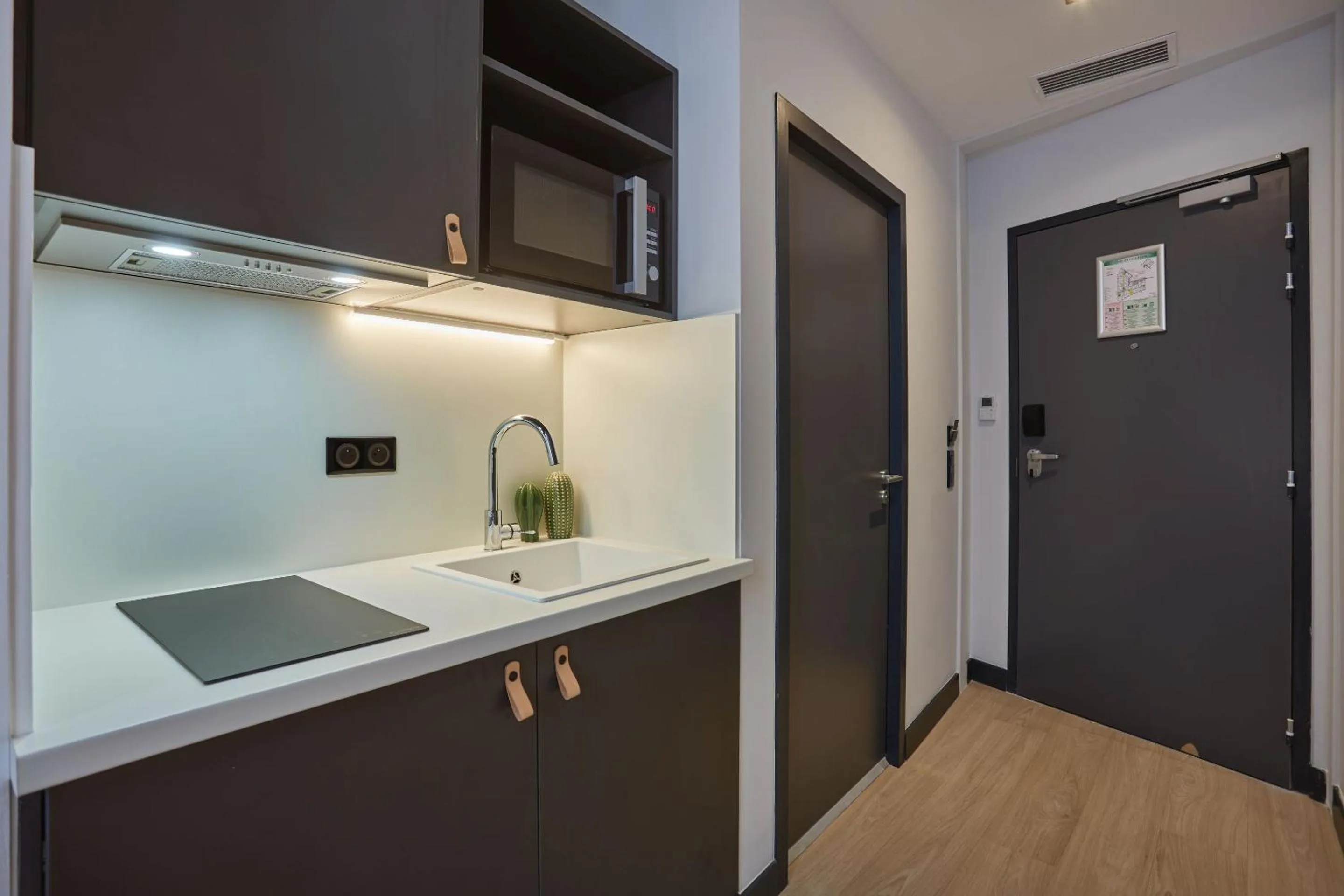 Kitchen or kitchenette in Appart'hôtel Odalys City - Nîmes Arènes - Palais des Congrès