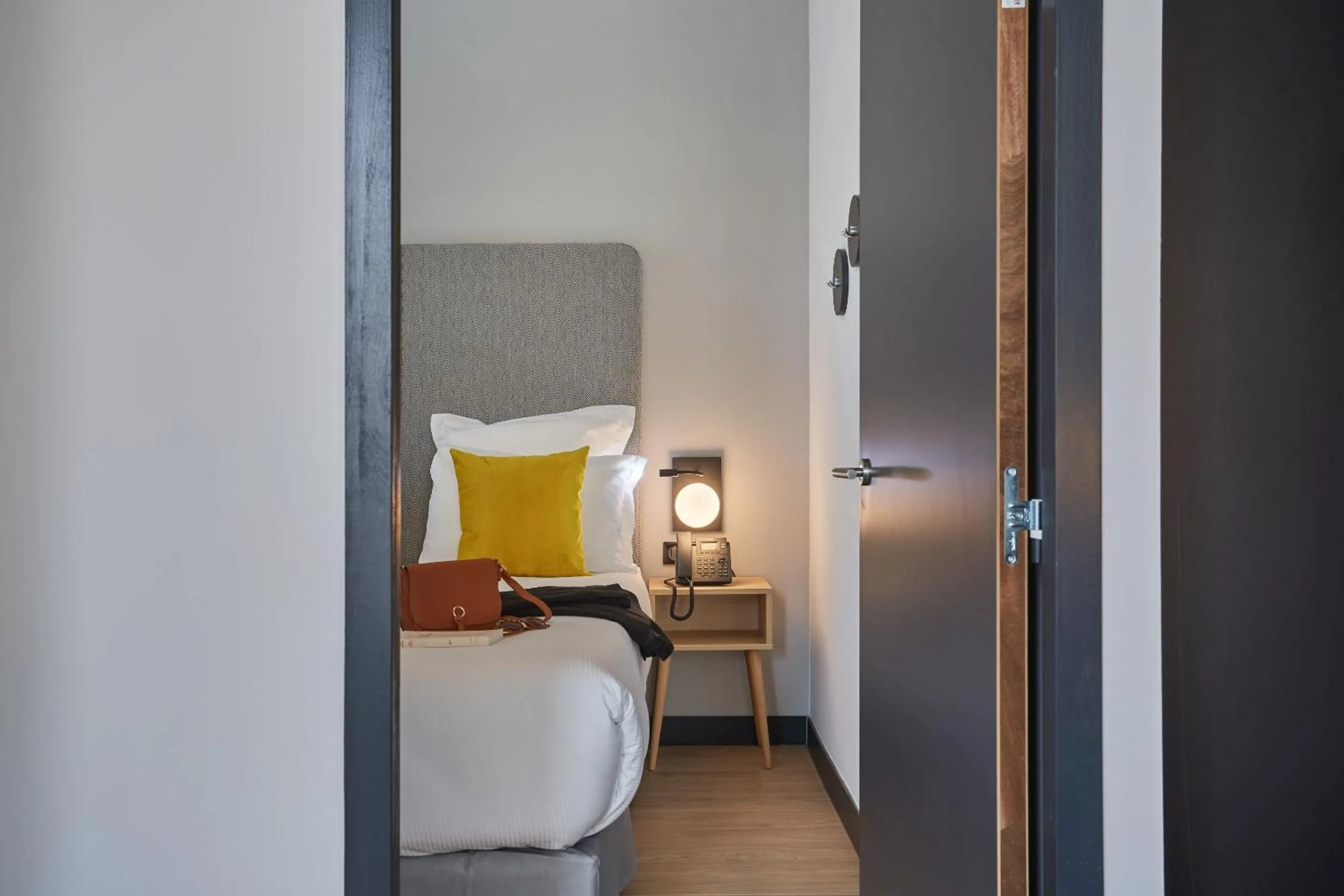 Bedroom, Bed in Appart'hôtel Odalys City - Nîmes Arènes - Palais des Congrès