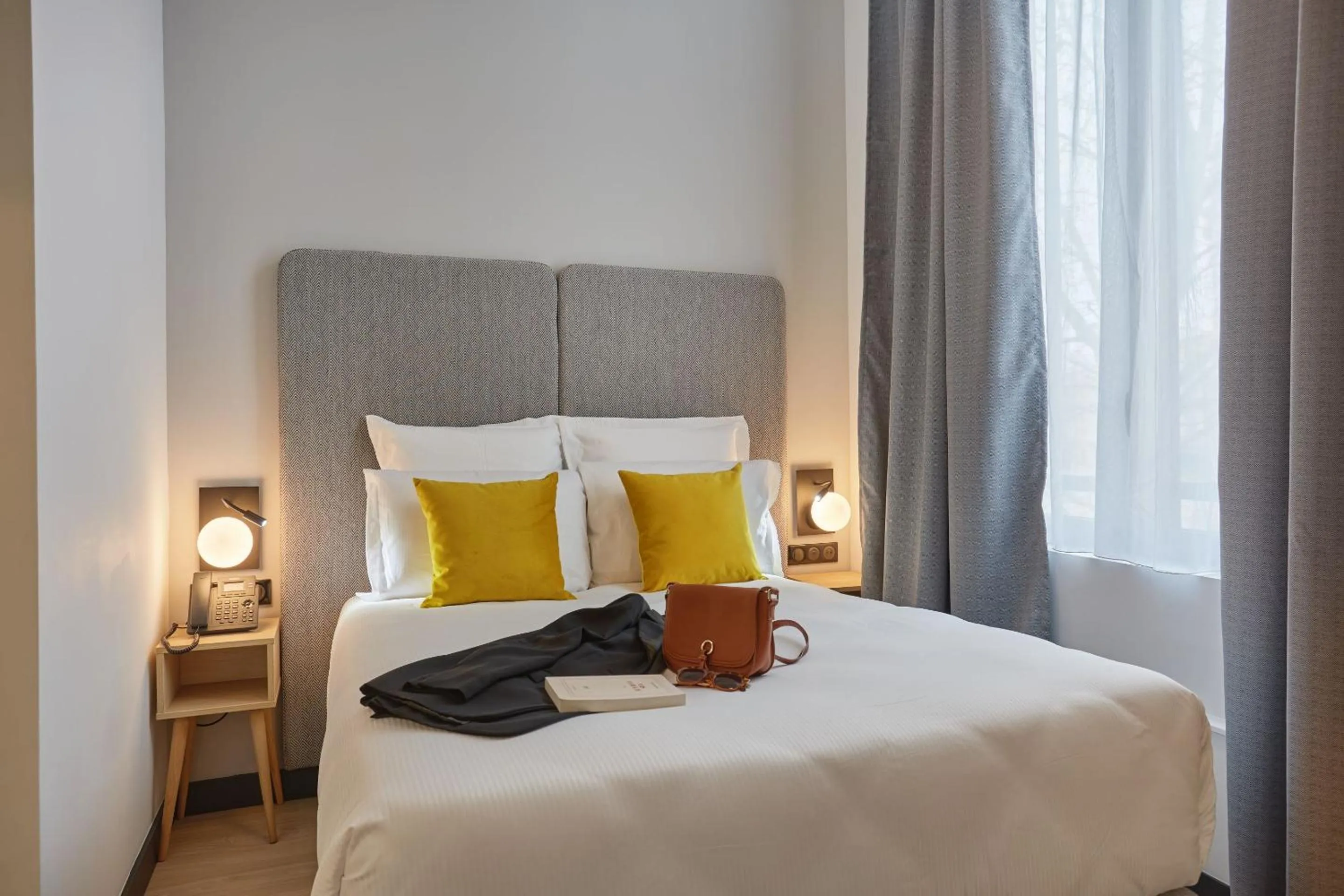 Bedroom, Bed in Appart'hôtel Odalys City - Nîmes Arènes - Palais des Congrès