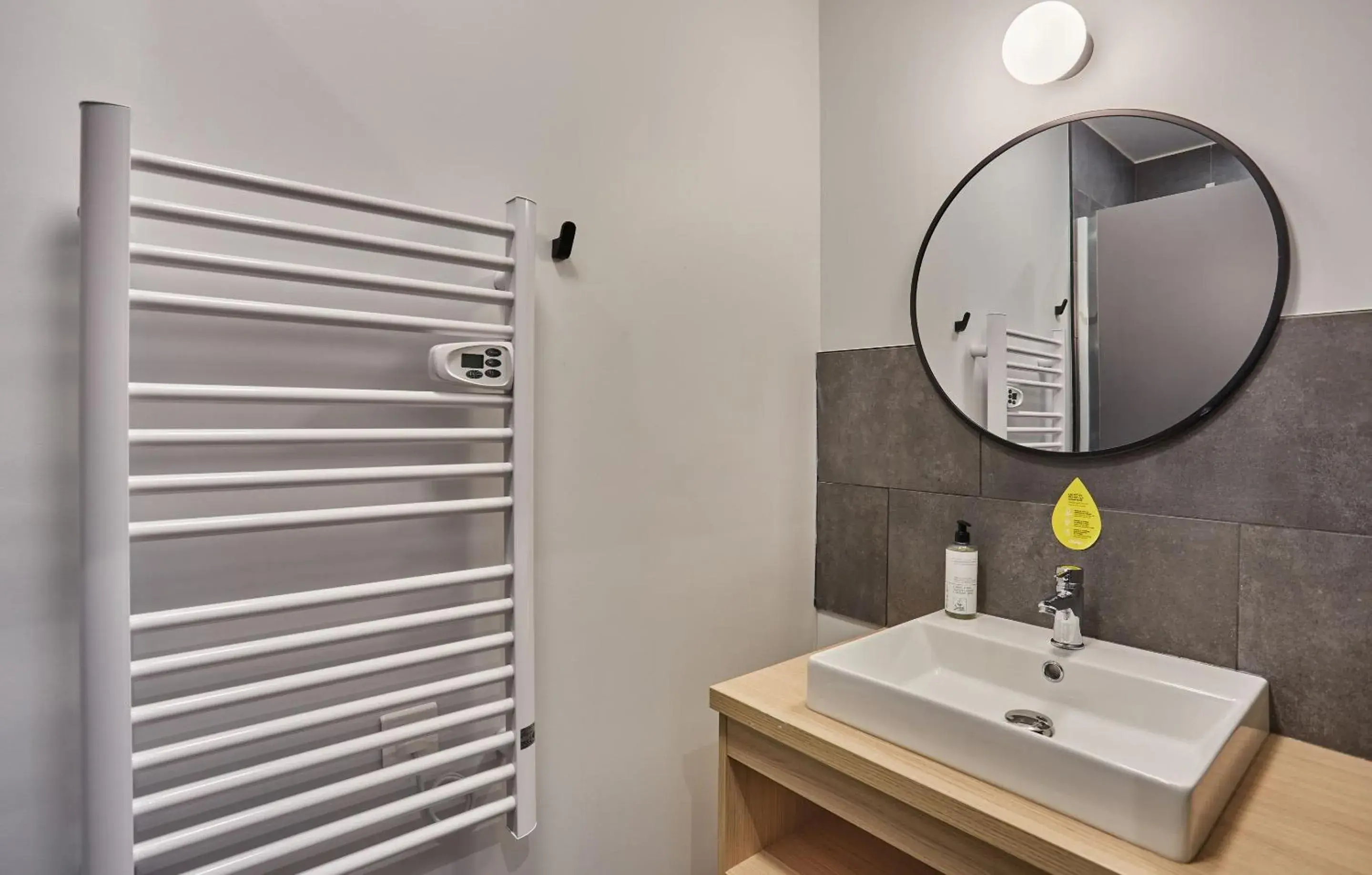 Bathroom in Appart'hôtel Odalys City - Nîmes Arènes - Palais des Congrès Bathroom in Appart'hôtel Odalys City - Nîmes Arènes - Palais des Congrès