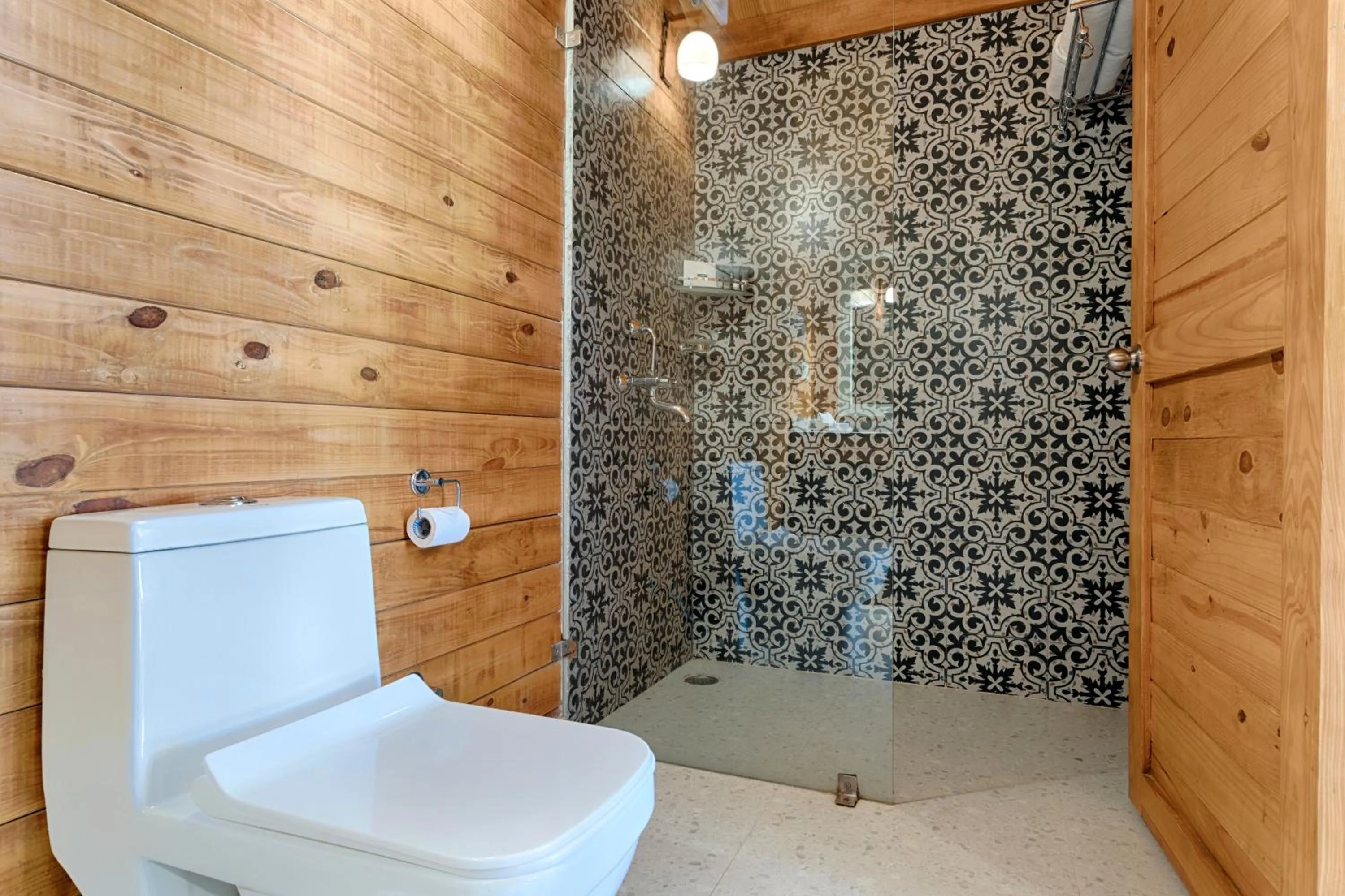 Shower in Stone Wood Premier Dandeli