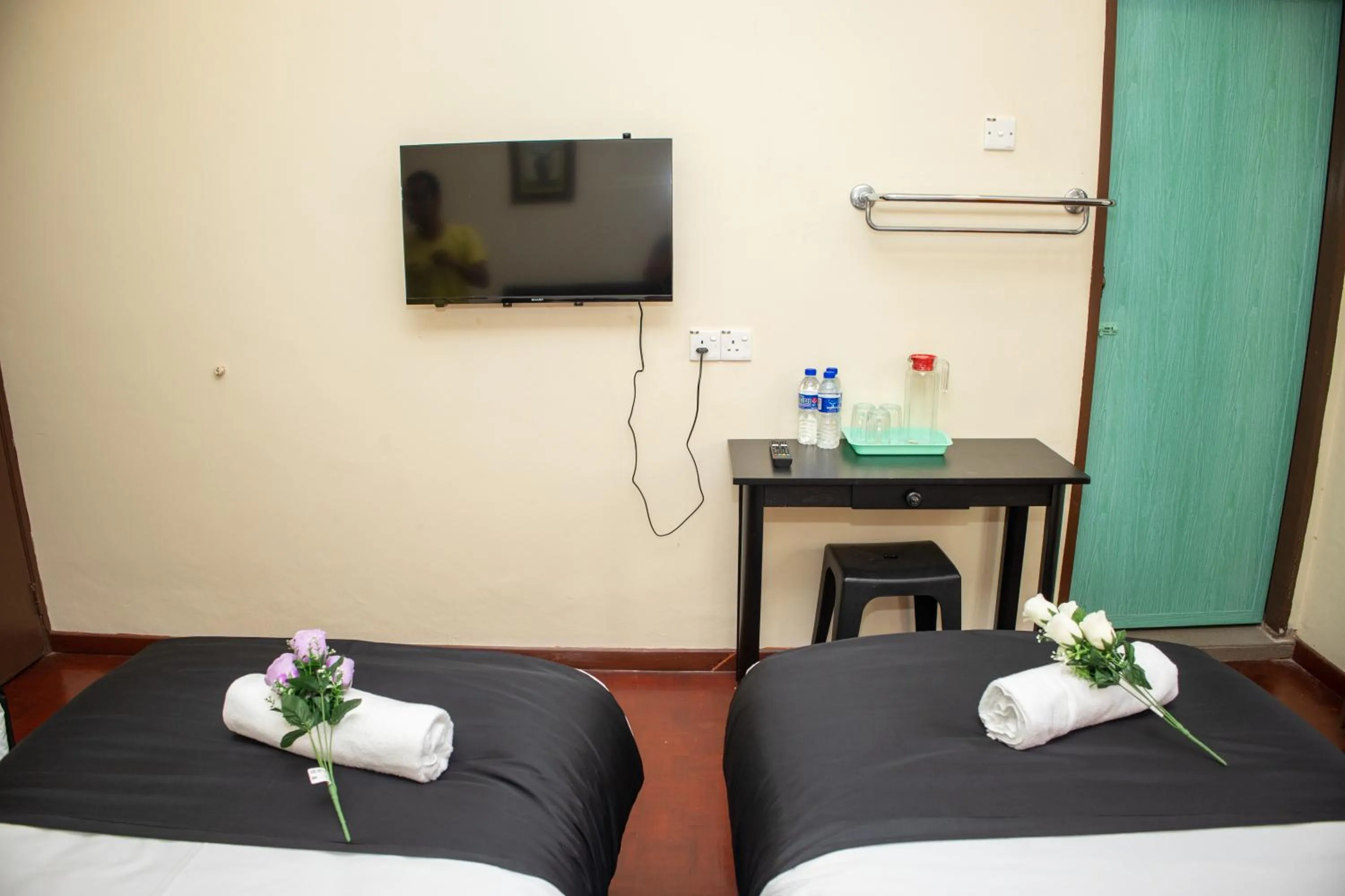 Communal lounge/ TV room, Bed in Sweet Inn Guest House