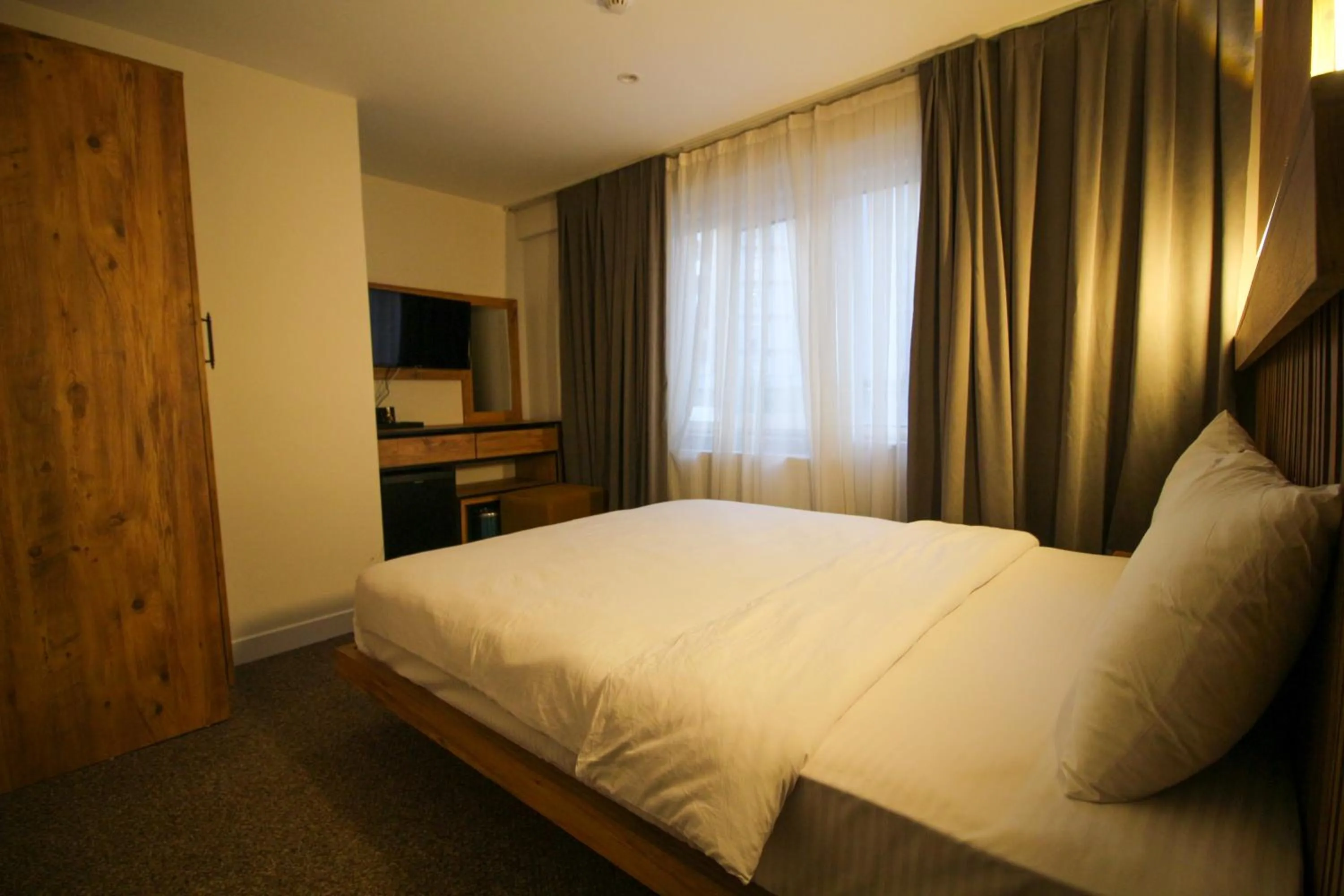 Bed in Kaya Hotel SAW