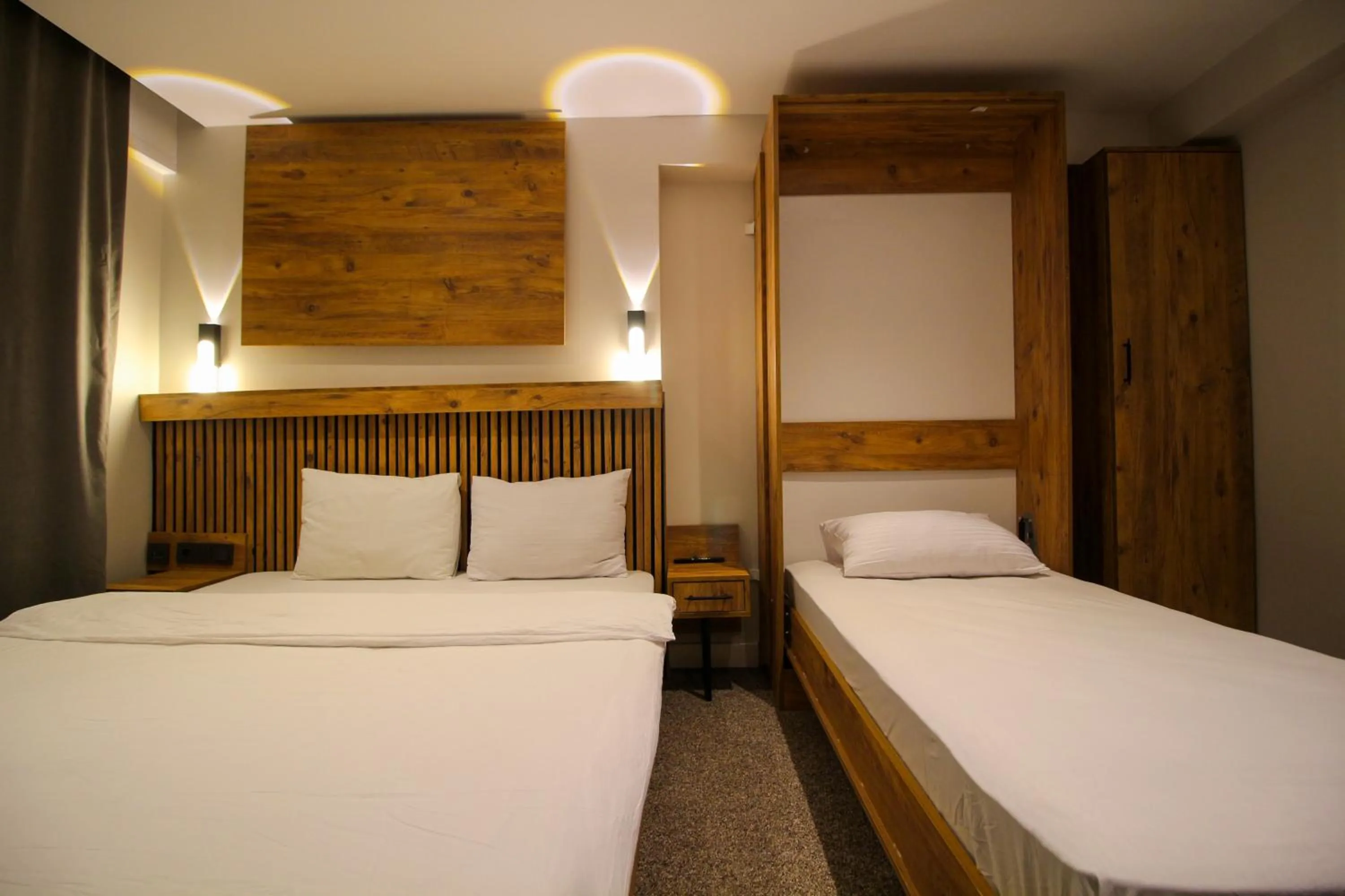 Bed in Kaya Hotel SAW