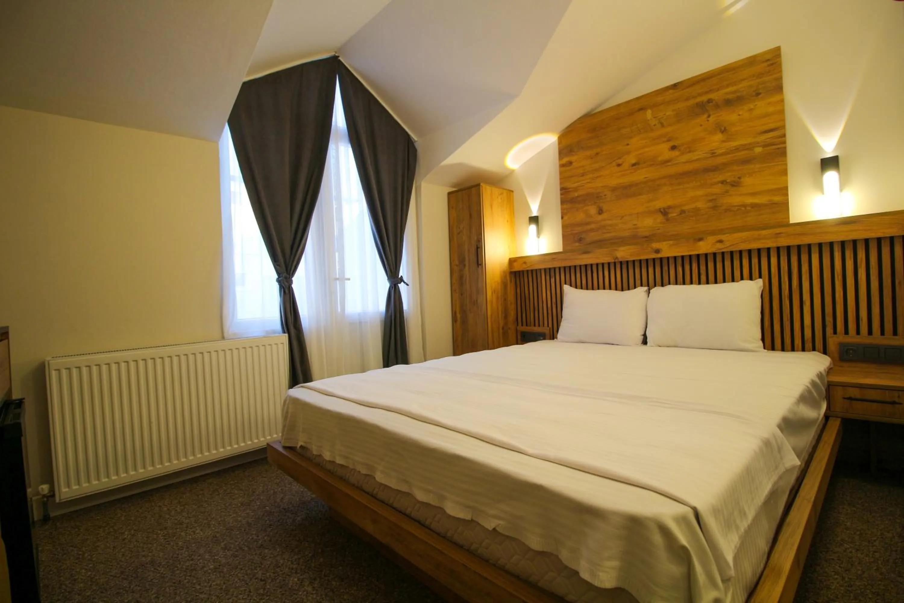 Bed in Kaya Hotel SAW