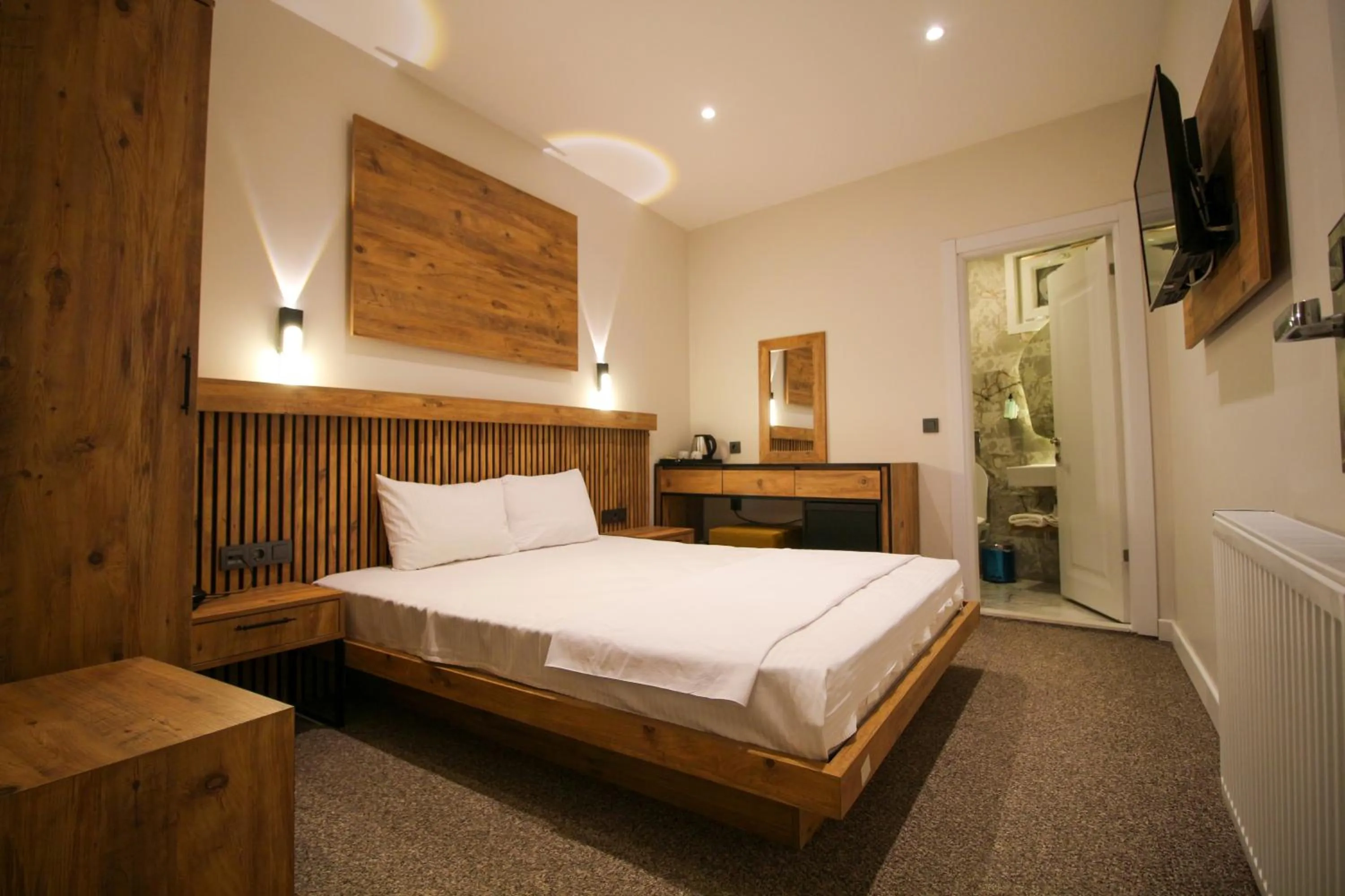 Bed in Kaya Hotel SAW