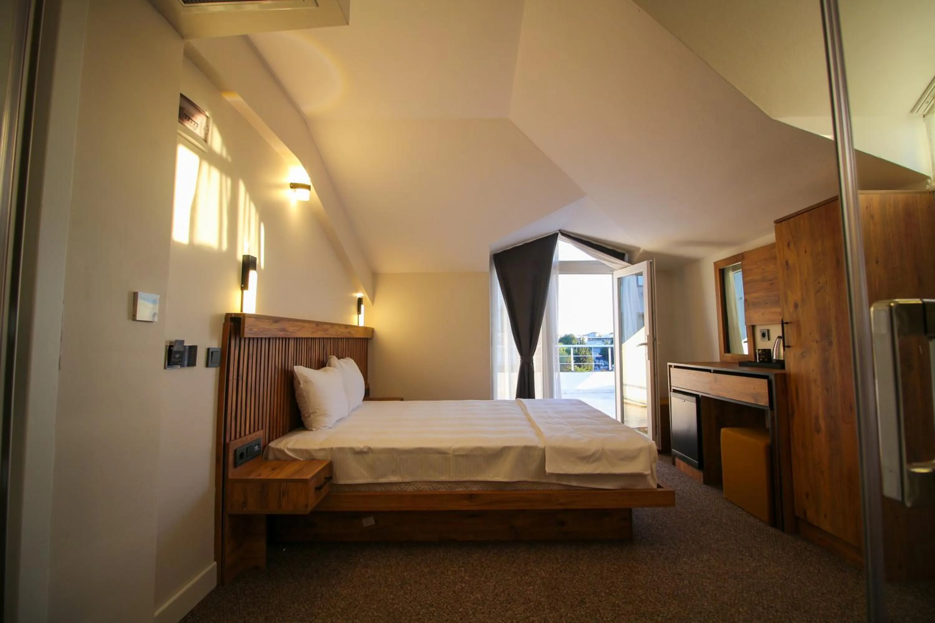 Bed in Kaya Hotel SAW