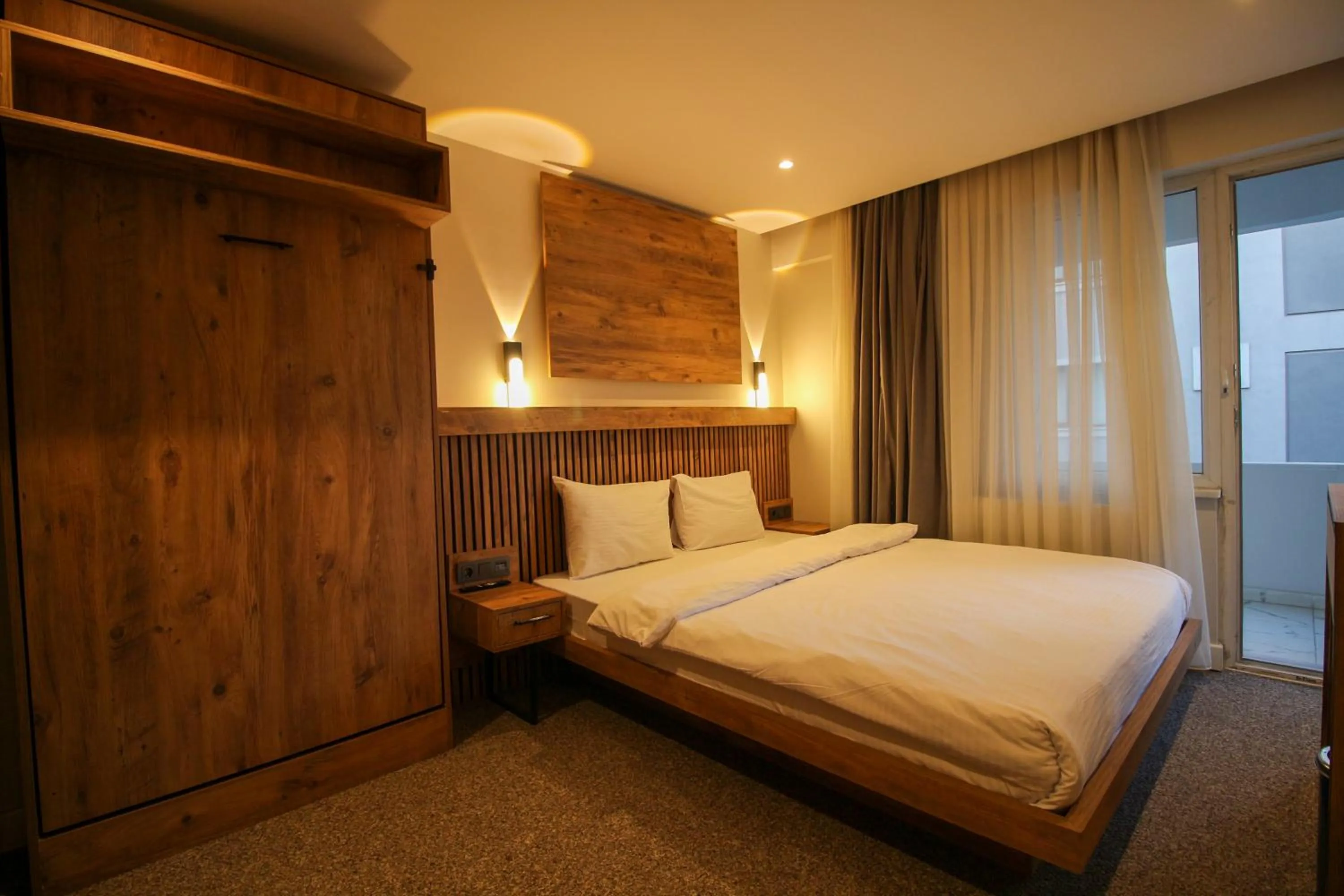 Bed in Kaya Hotel SAW