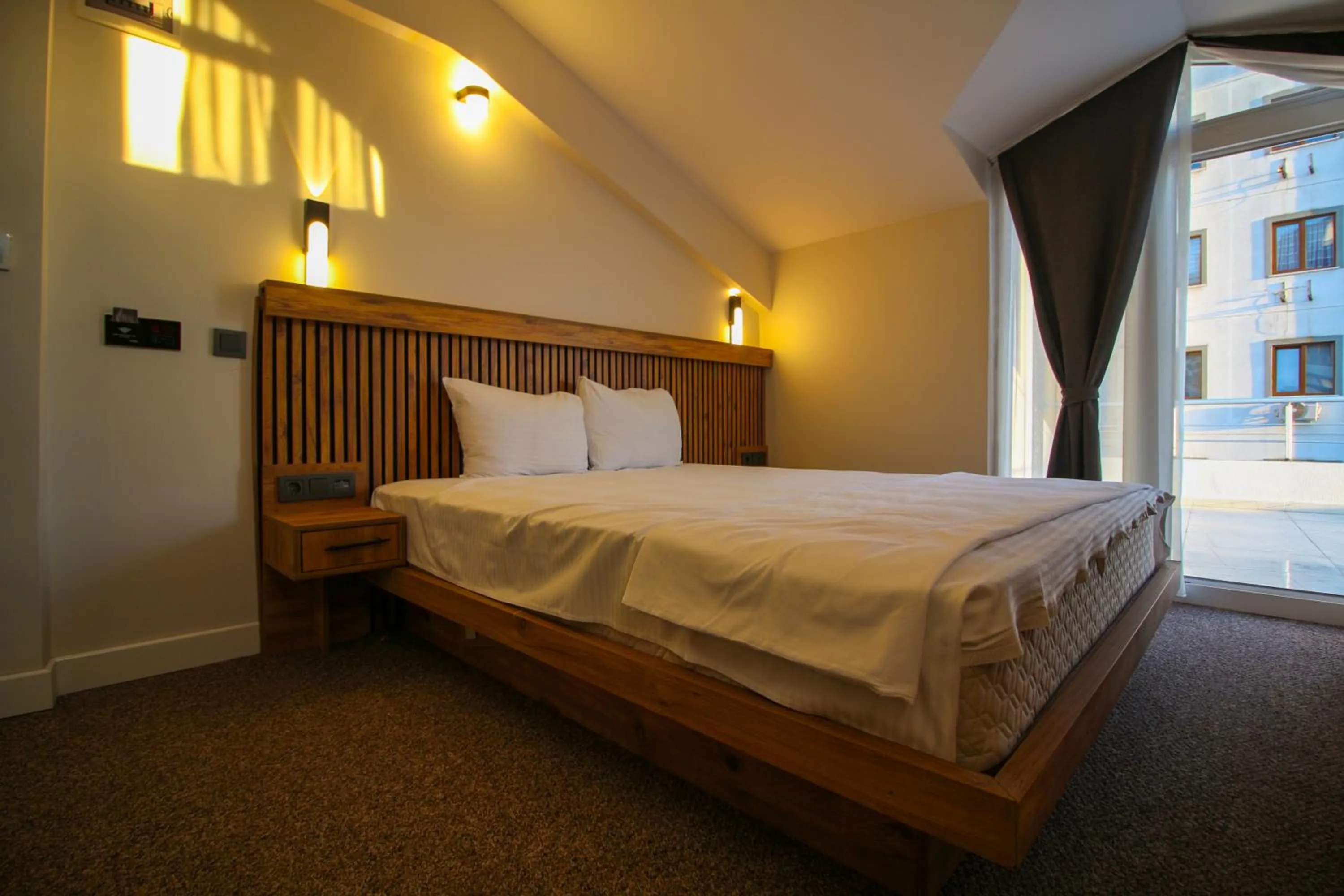 Bed in Kaya Hotel SAW