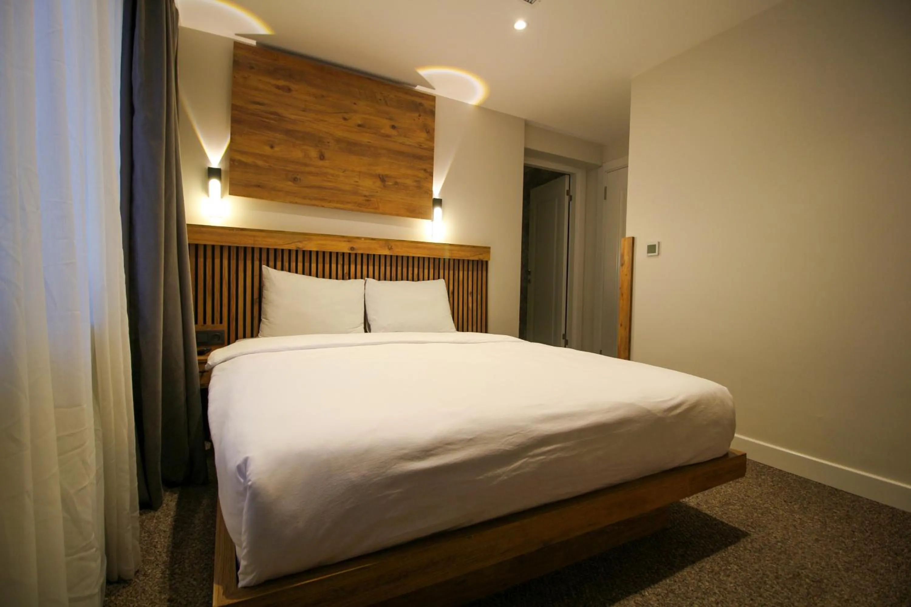 Bed in Kaya Hotel SAW