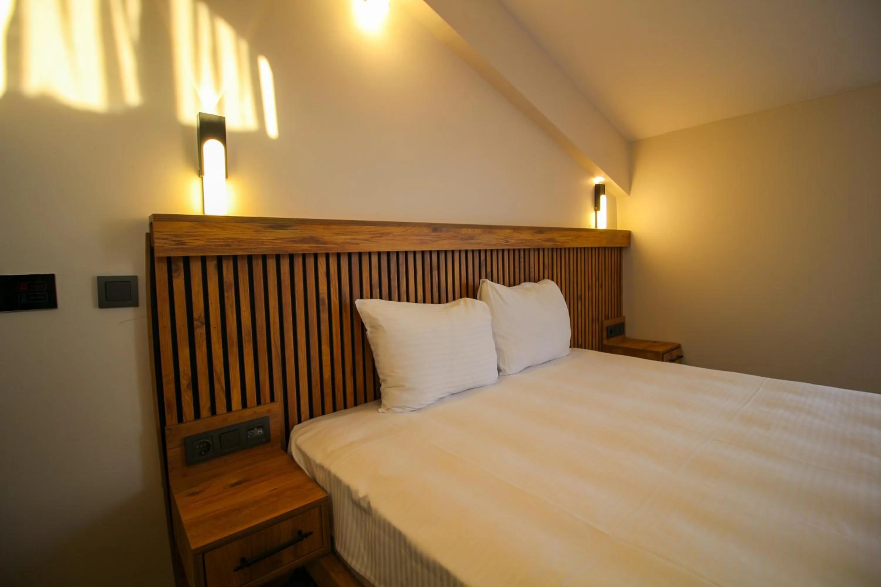 Bed in Kaya Hotel SAW