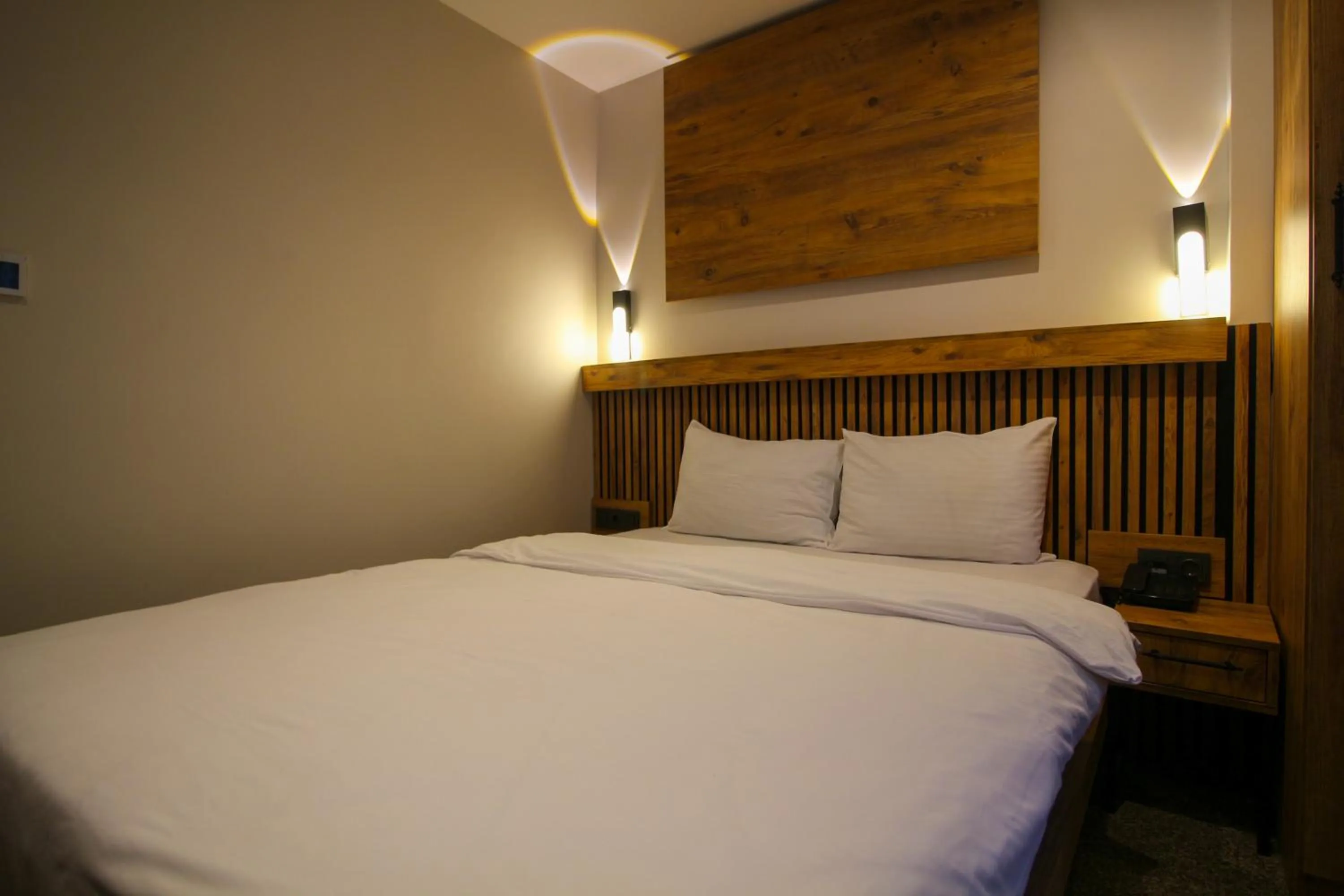 Bed in Kaya Hotel SAW