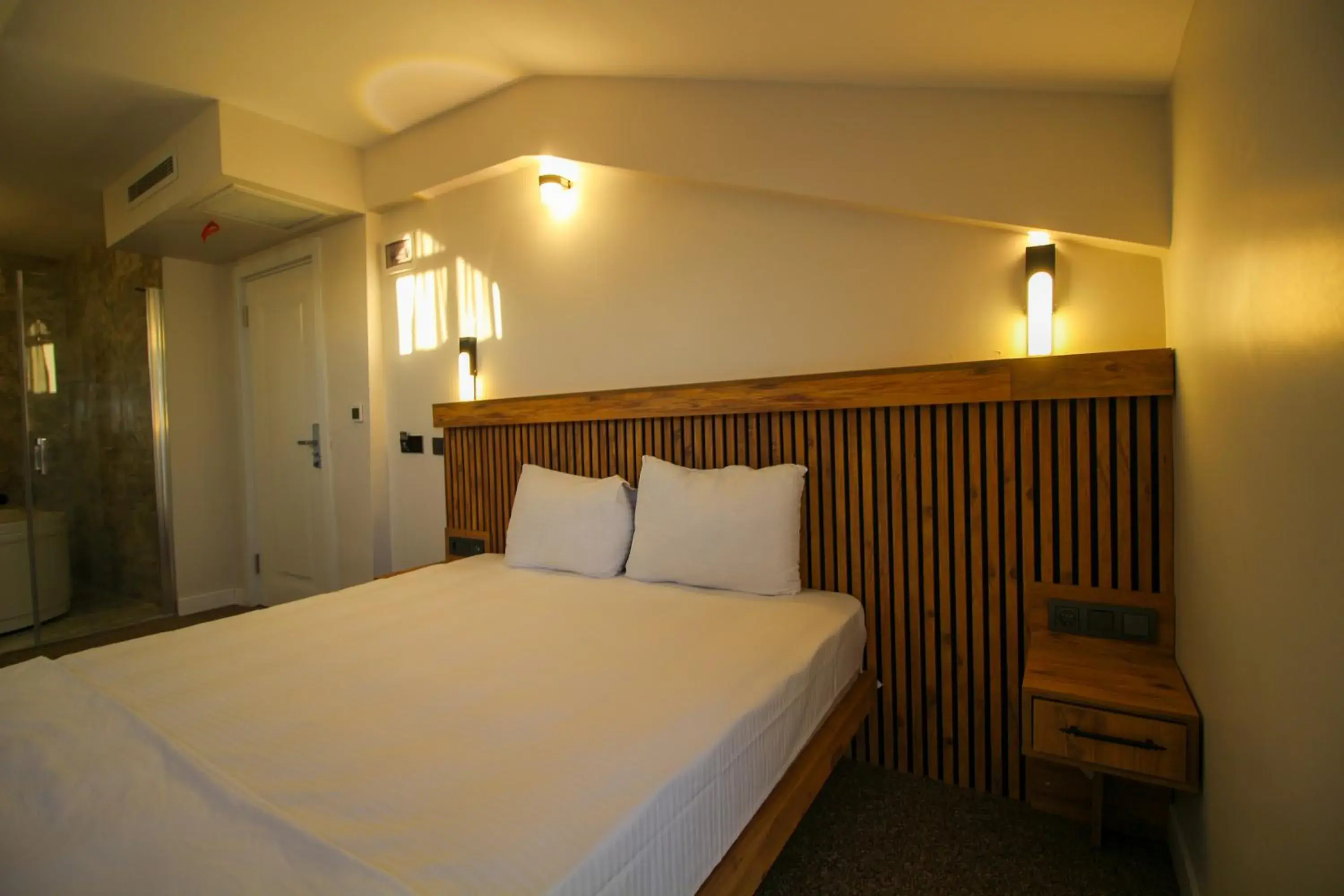 Bed in Kaya Hotel SAW Bed in Kaya Hotel SAW