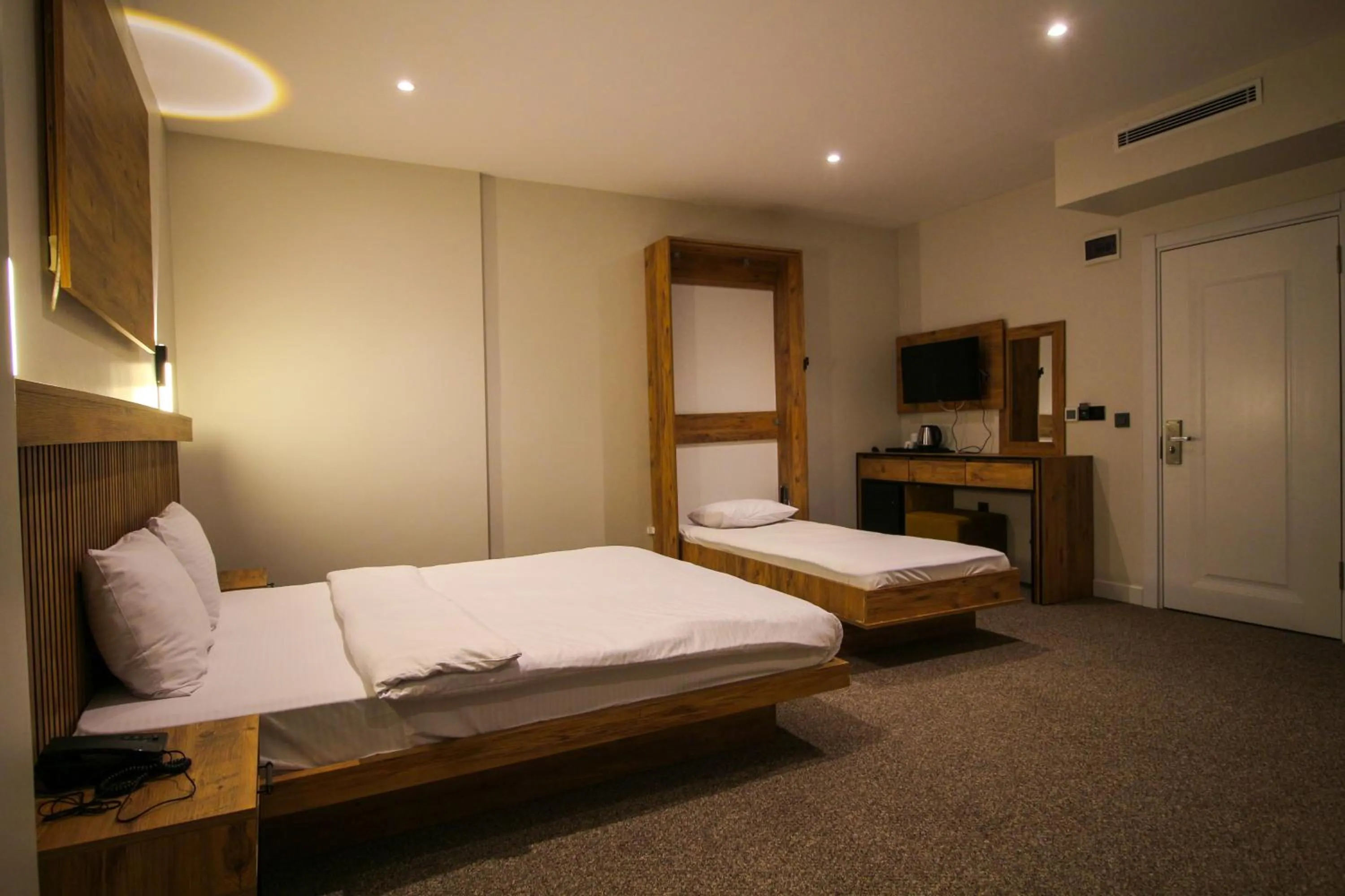 Bed in Kaya Hotel SAW