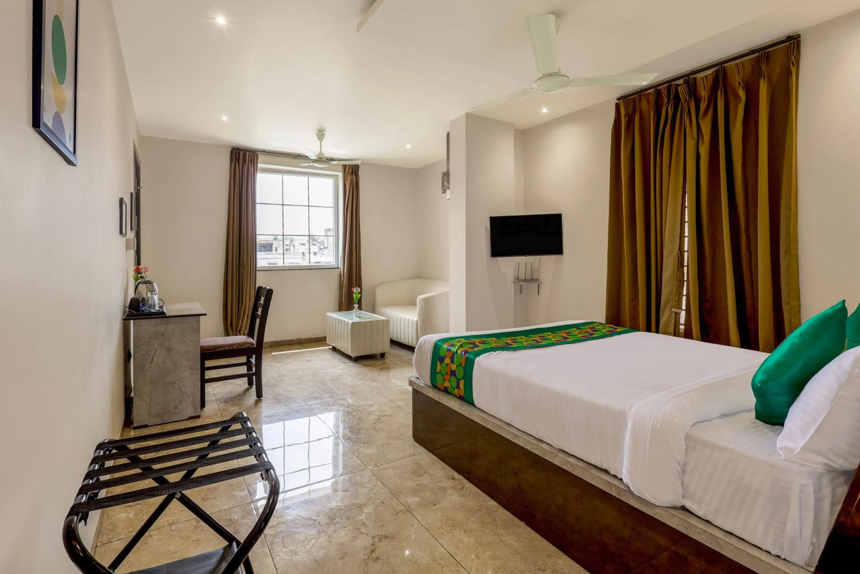 Bedroom, Bed in Treebo Iraa, 5 Minutes From Railway Station